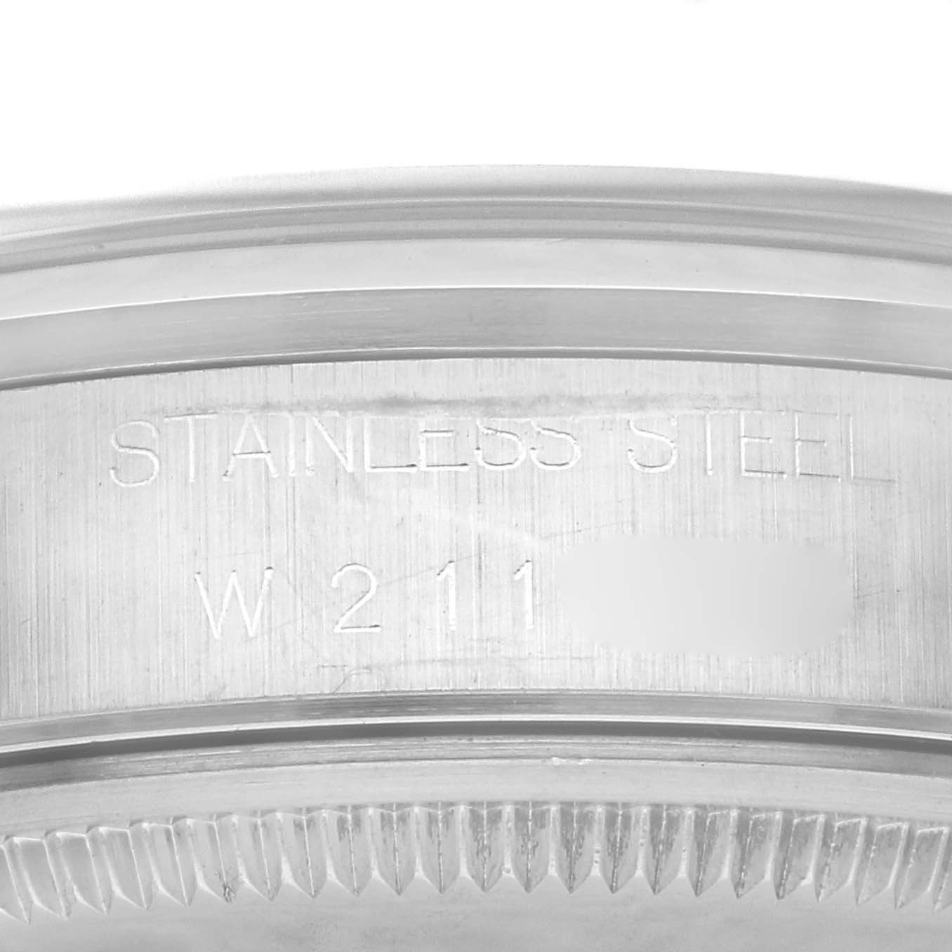 This image shows a close-up of the side engraving on the case back of a Rolex Air-King 14000 Men's Stainless Steel Blue Dial 14000 Men's Stainless Steel Blue Dial watch, highlighting the stainless steel material.
