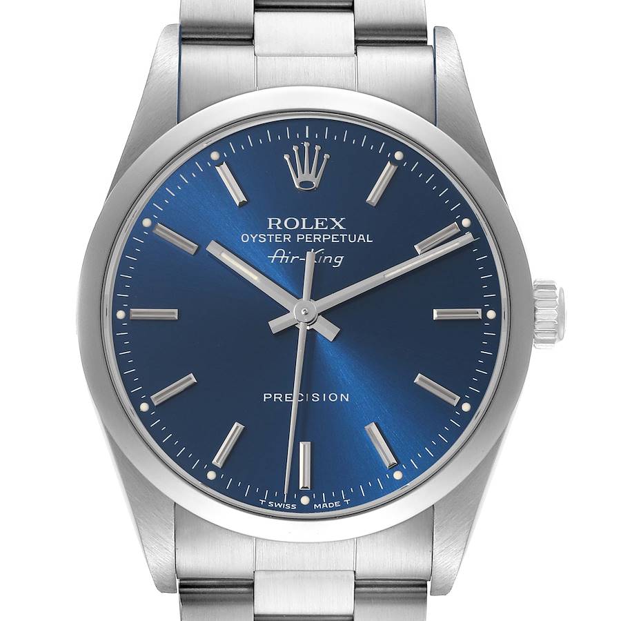 The image shows a front view of the Rolex Air-King watch, highlighting its blue dial, bezel, crown, and stainless steel bracelet.