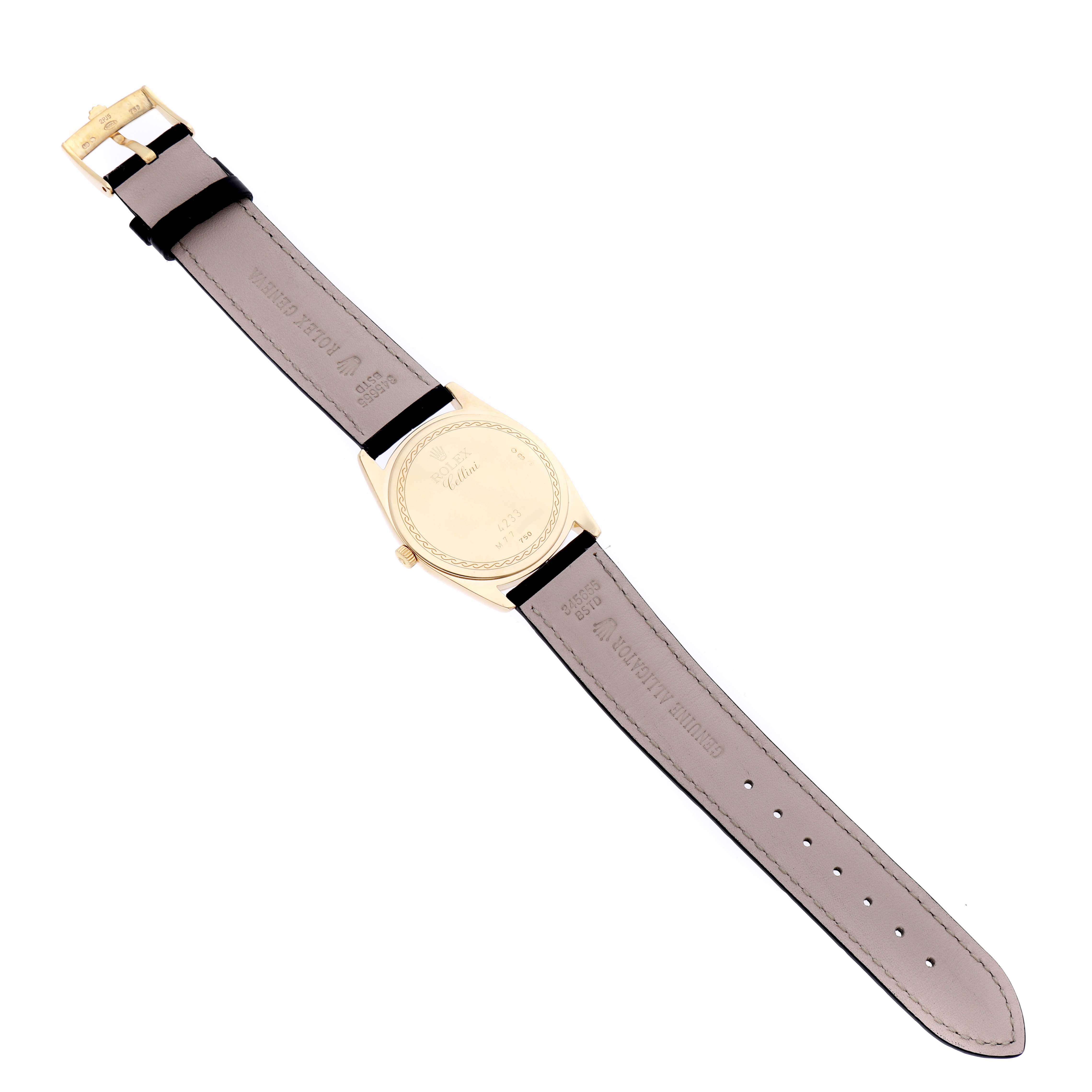 The image shows the back and strap of a Rolex Cellini 4233/8 Men's Yellow Gold Black Dial 4233/8 Men's Yellow Gold Black Dial watch laid flat.
