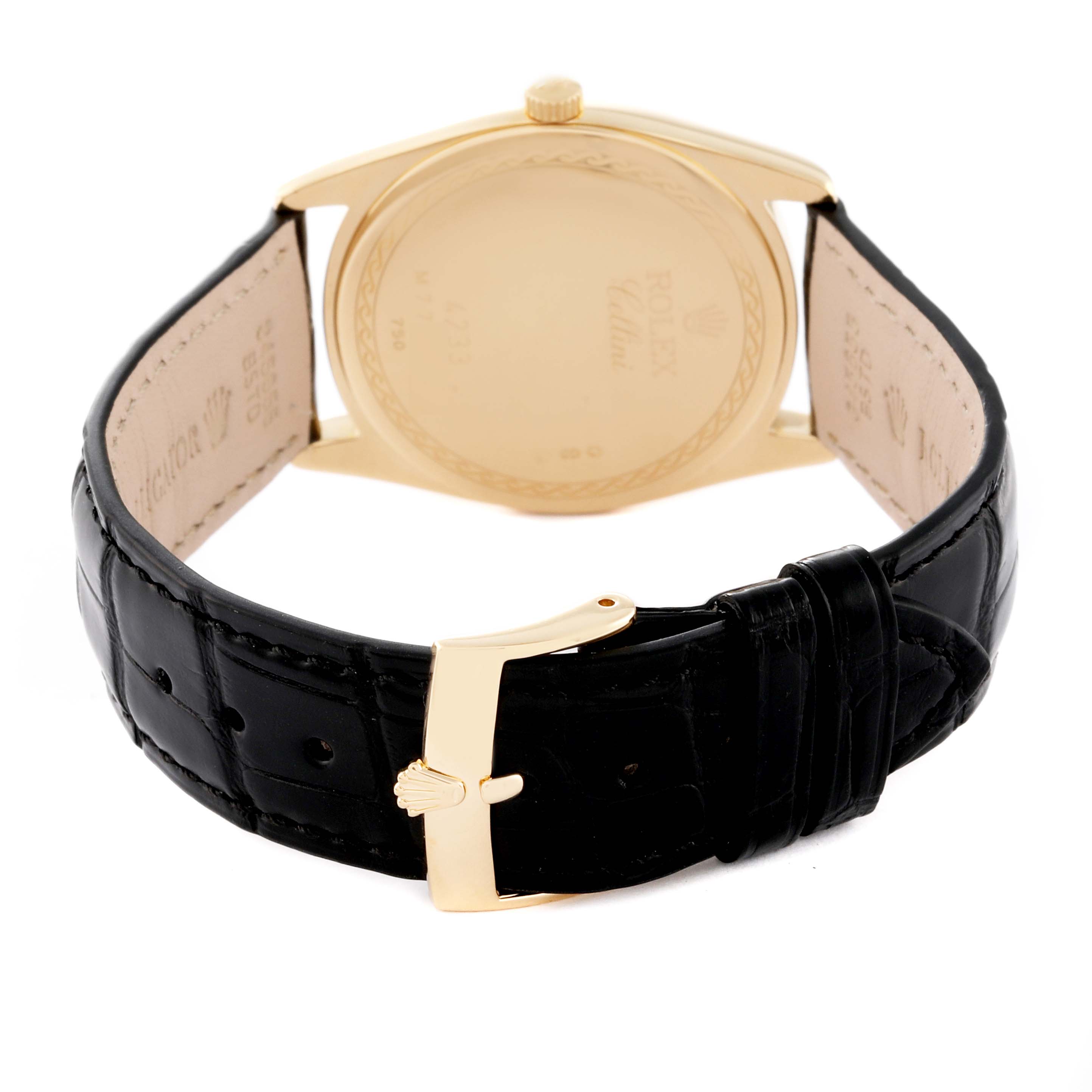 The image shows the back of a Rolex Cellini 4233/8 Men's Yellow Gold Black Dial 4233/8 Men's Yellow Gold Black Dial watch, focusing on the black leather strap and gold clasp.