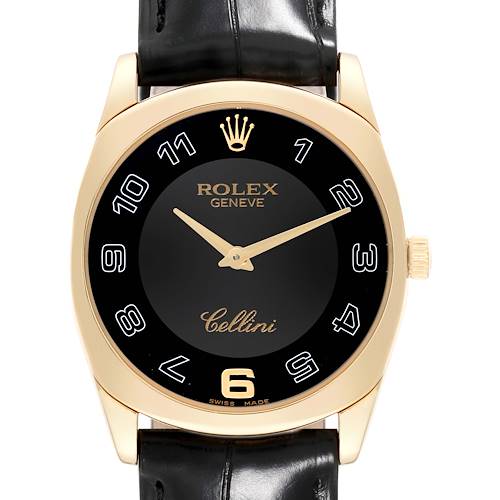 The Rolex Cellini watch is shown from a front angle, highlighting its black dial, gold-tone case, and leather strap.