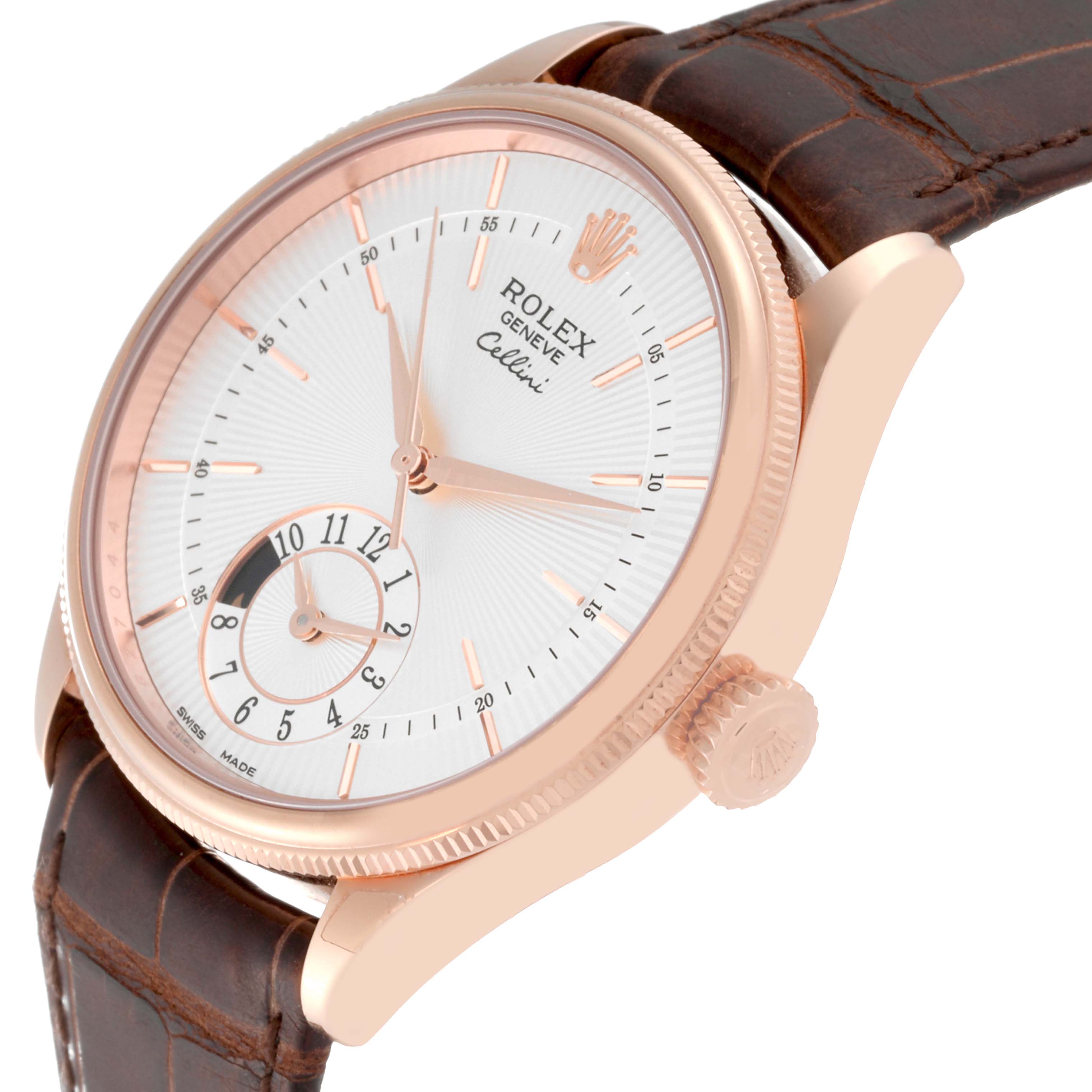 The image shows a close-up of the Rolex Cellini 50525 Men's Rose Gold Silver Dial 50525 Men's Rose Gold Silver Dial watch, highlighting the brown leather strap, crown, and watch dial.