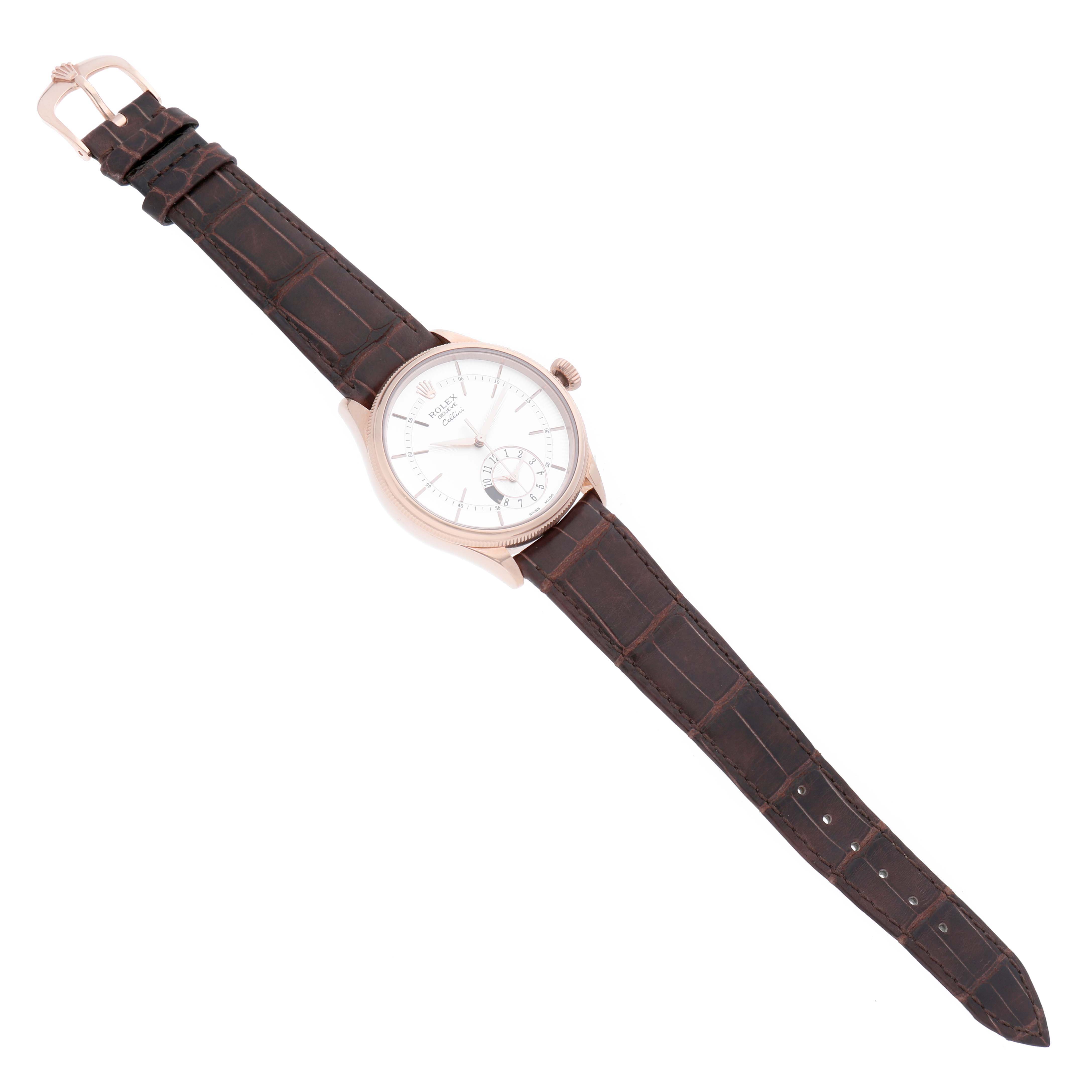 The image shows a Rolex Cellini 50525 Men's Rose Gold Silver Dial 50525 Men's Rose Gold Silver Dial watch with a brown leather strap, viewed from a top-down angle.