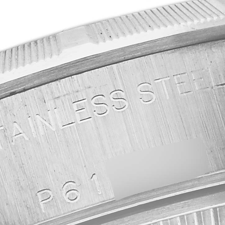 This close-up image shows the engraved stainless steel caseback of a Rolex Date 79190 Women
s Stainless Steel White Dial 79190 Women
s Stainless Steel White Dial model watch.