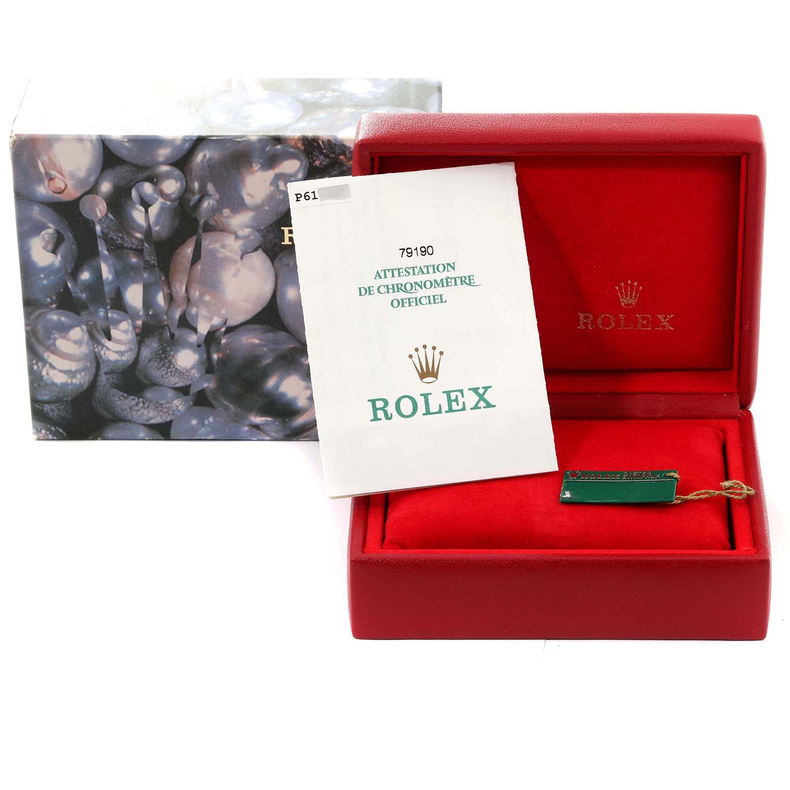 The image shows the packaging, box, and documentation for a Rolex Date 79190 Women
s Stainless Steel White Dial 79190 Women
s Stainless Steel White Dial model watch.