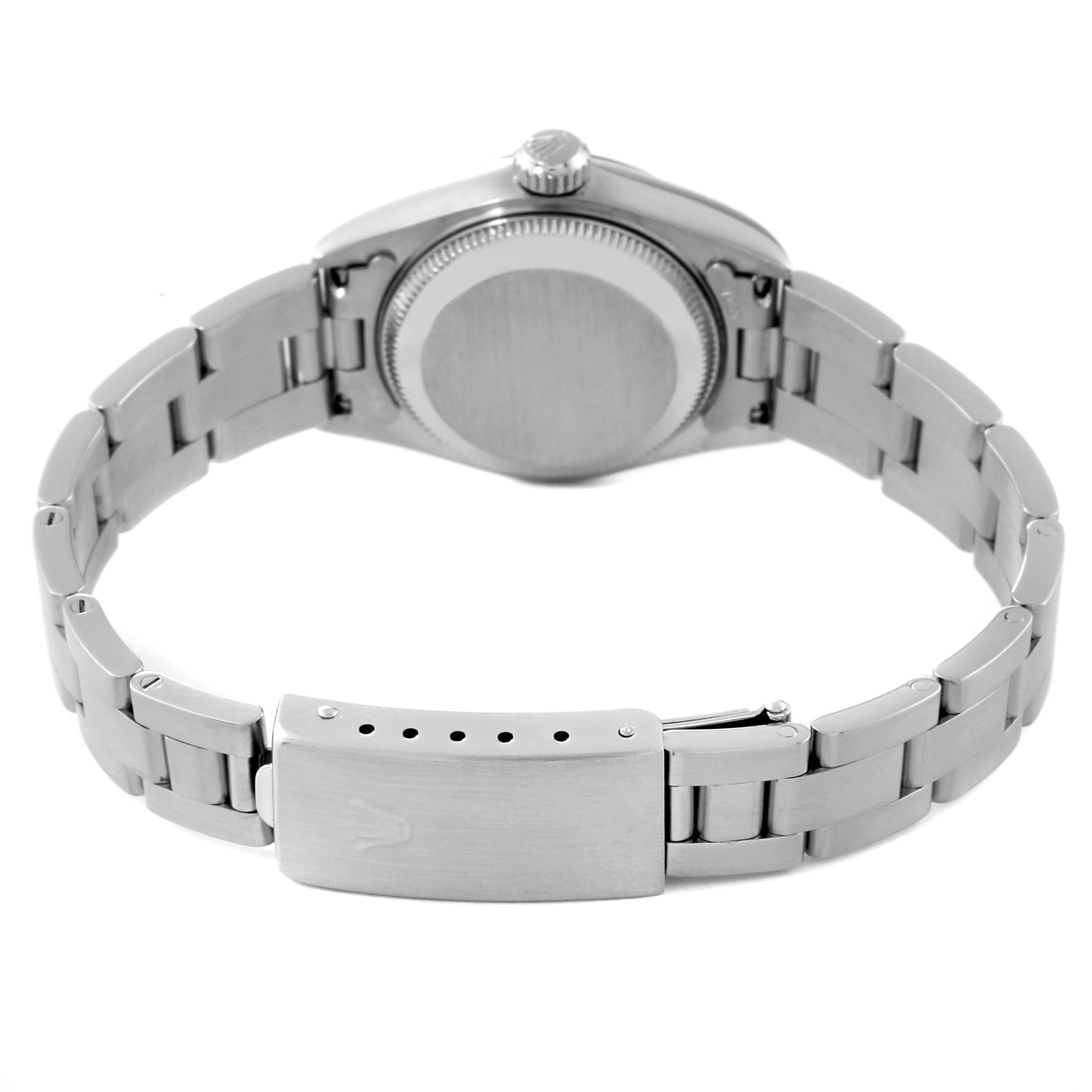 The image shows the back view of a Rolex Date 79190 Women
s Stainless Steel White Dial 79190 Women
s Stainless Steel White Dial model watch, highlighting its closed case back, bracelet, and clasp.