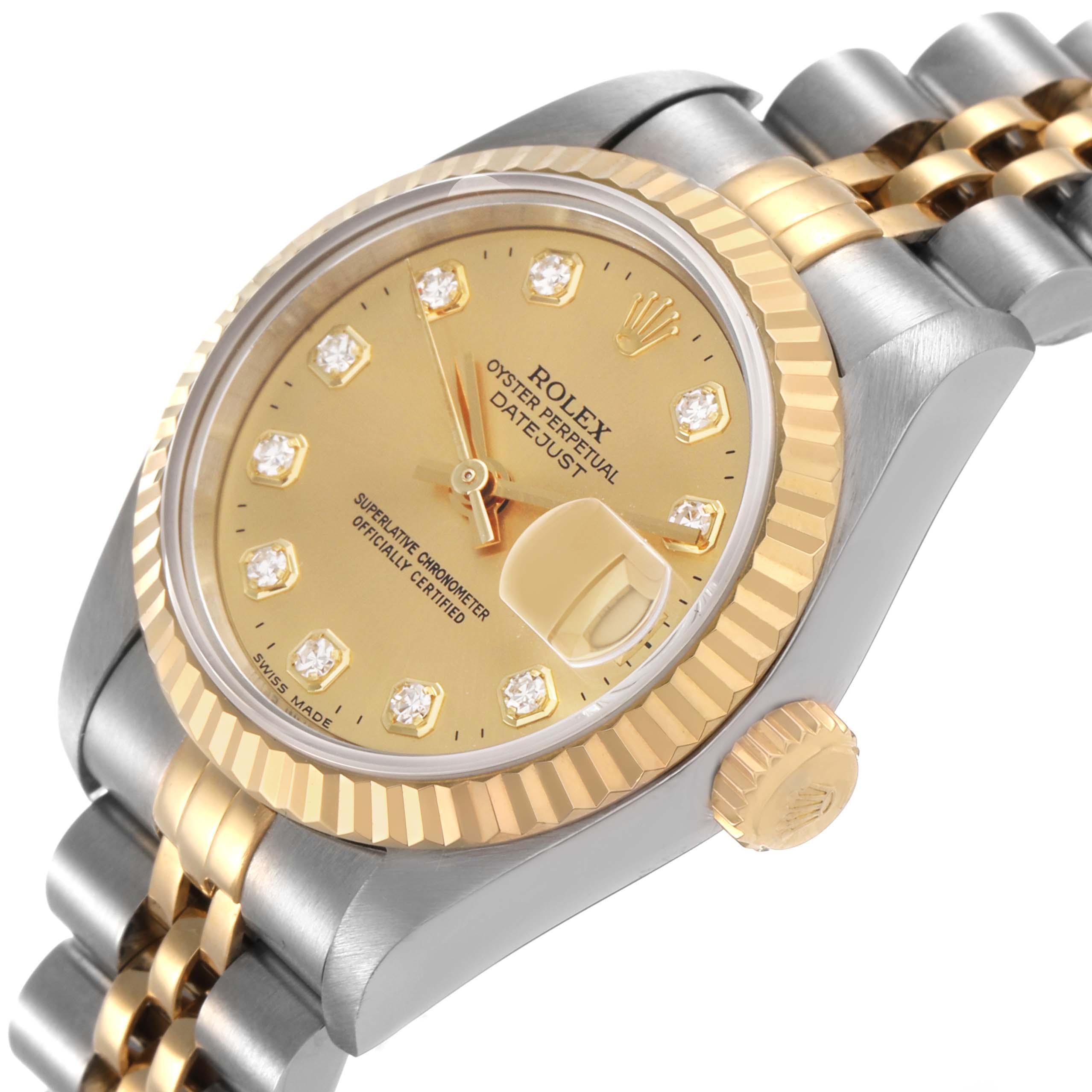 The Rolex Datejust 69173 Women's Steel and Gold (two tone) Champagne Dial watch is shown at a slight angle, highlighting its gold dial, fluted bezel, crown, and two-tone bracelet.