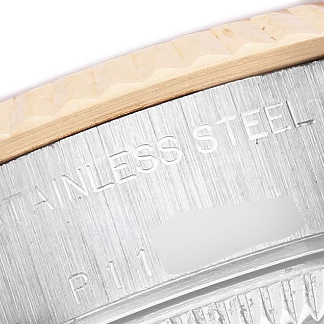 The image shows a close-up of the side of a Rolex Datejust 79173 Women's Steel and Gold (two tone) White Dial watch case, highlighting the stainless steel material and part of the bezel.
