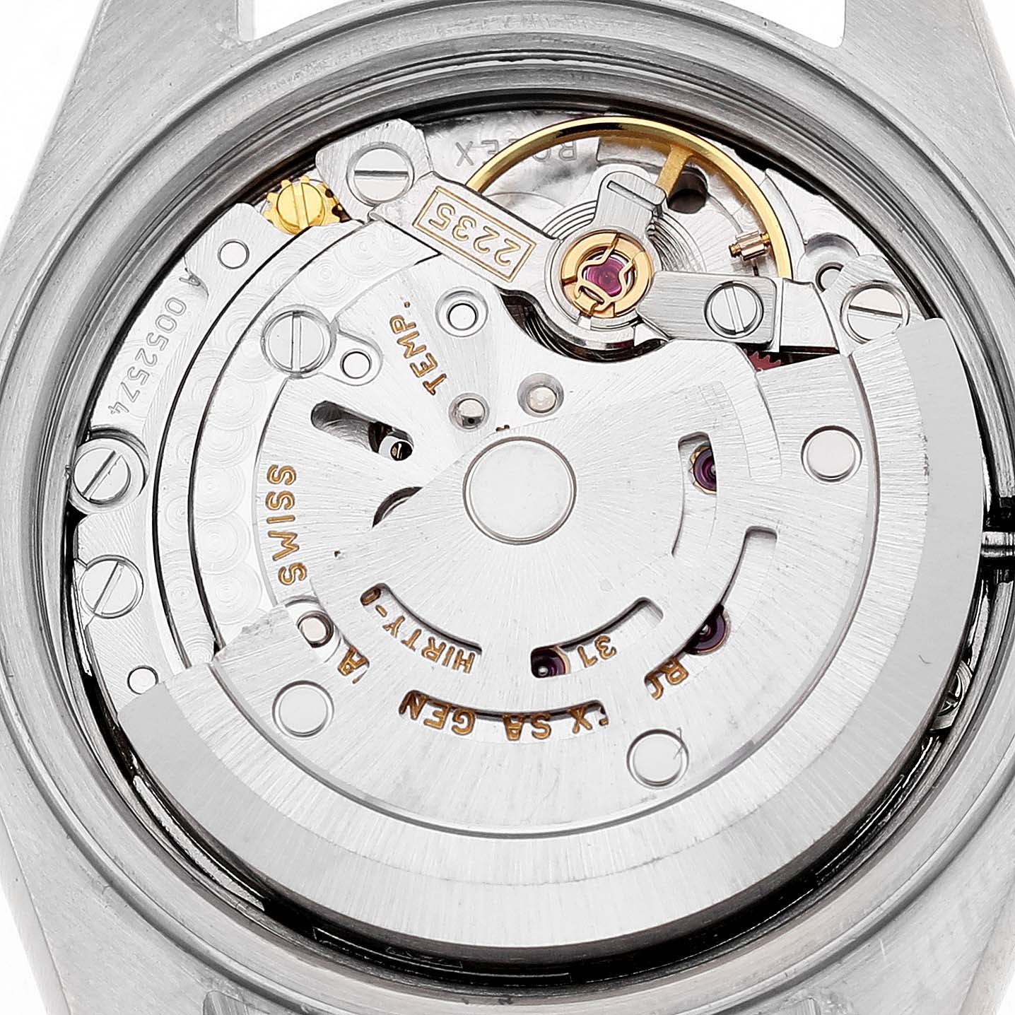 The image shows the intricate movement of a Rolex Datejust 79173 Women's Steel and Gold (two tone) White Dial watch, viewed from the back.