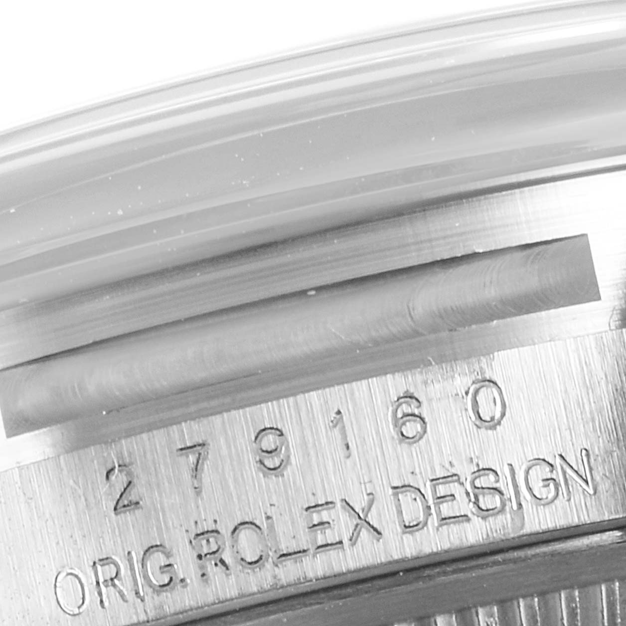 The image shows a close-up of the serial number and "ORIG. ROLEX DESIGN" engraving on the case of a Rolex Datejust 279160 Women's Stainless Steel Pink Dial 279160 Women's Stainless Steel Pink Dial watch.