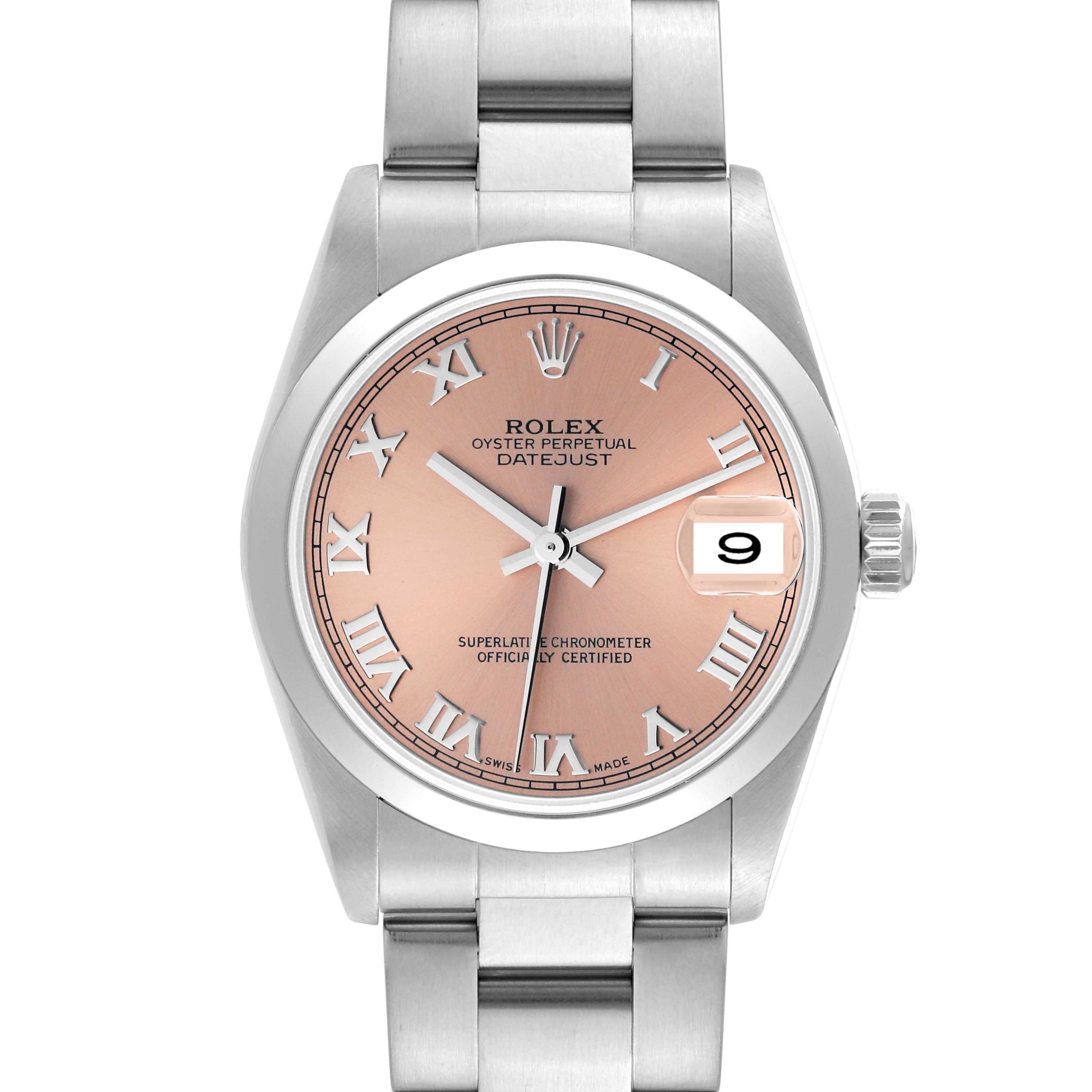 The image shows a front view of a Rolex Datejust Mid-Size watch, featuring a pink dial with Roman numerals and a stainless steel band.