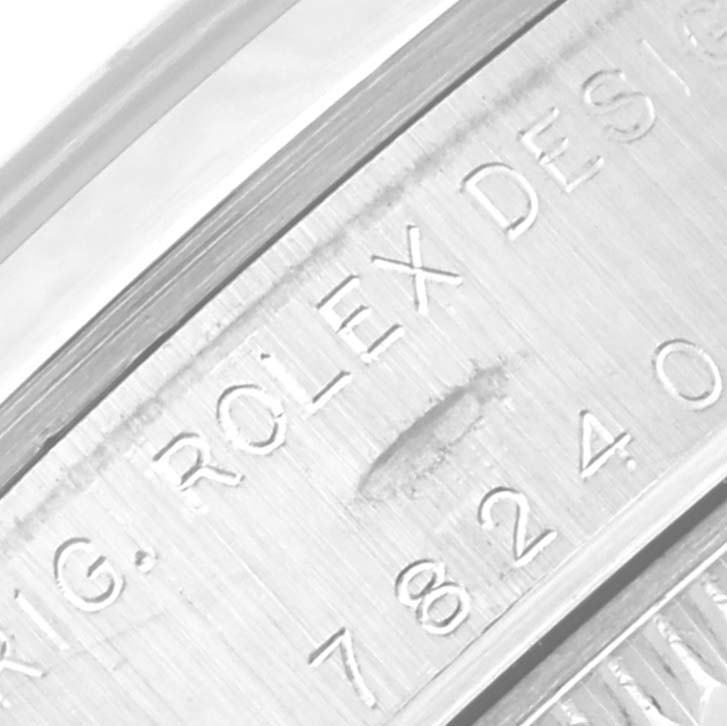Close-up of the side engraving on the case of a Mid-Size Rolex watch.