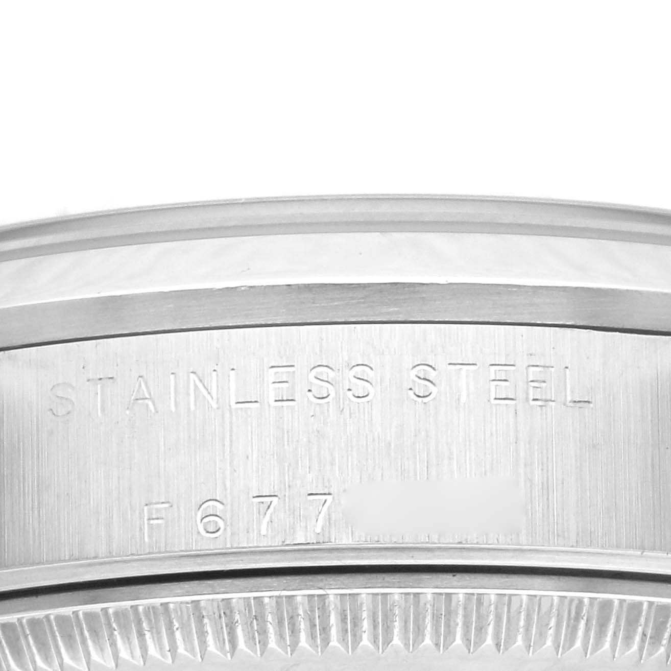 This image shows a close-up view of the stainless steel case side and part of the bezel of a Rolex Mid-Size 78240 Women's Stainless Steel Silver Dial 78240 Women's Stainless Steel Silver Dial model watch.