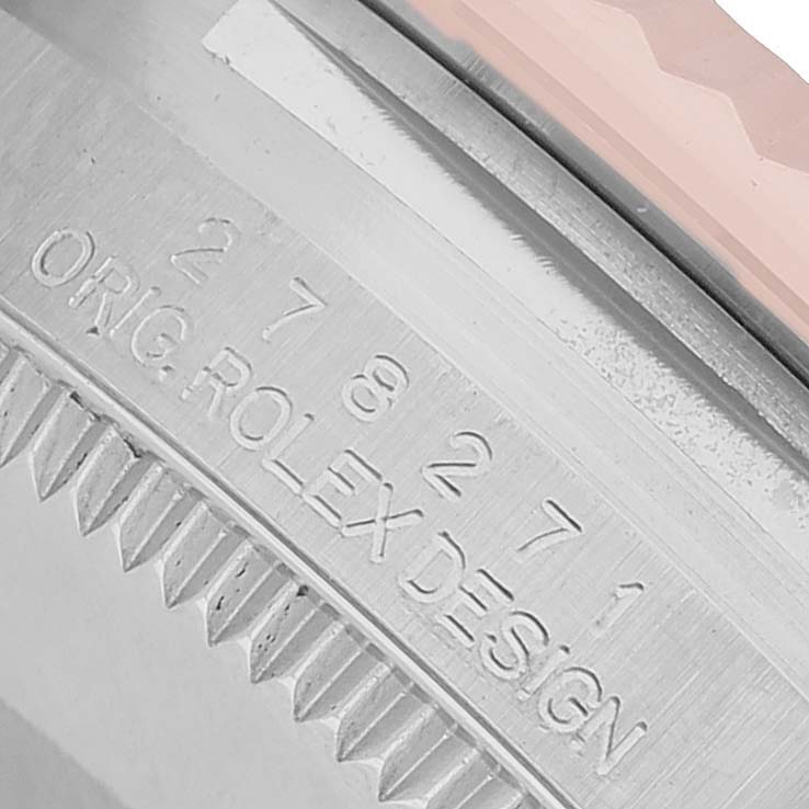 The image shows a close-up of the side engraving with the serial number and text "ORIG. ROLEX DESIGN" on a Rolex Mid-Size 278271 Women's Steel and Gold (two tone) Pink Dial watch.