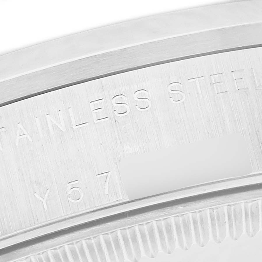 This image shows a close-up of the stainless steel case back and model number of a Rolex Mid-Size 78240 Women's Stainless Steel White Dial 78240 Women's Stainless Steel White Dial watch.