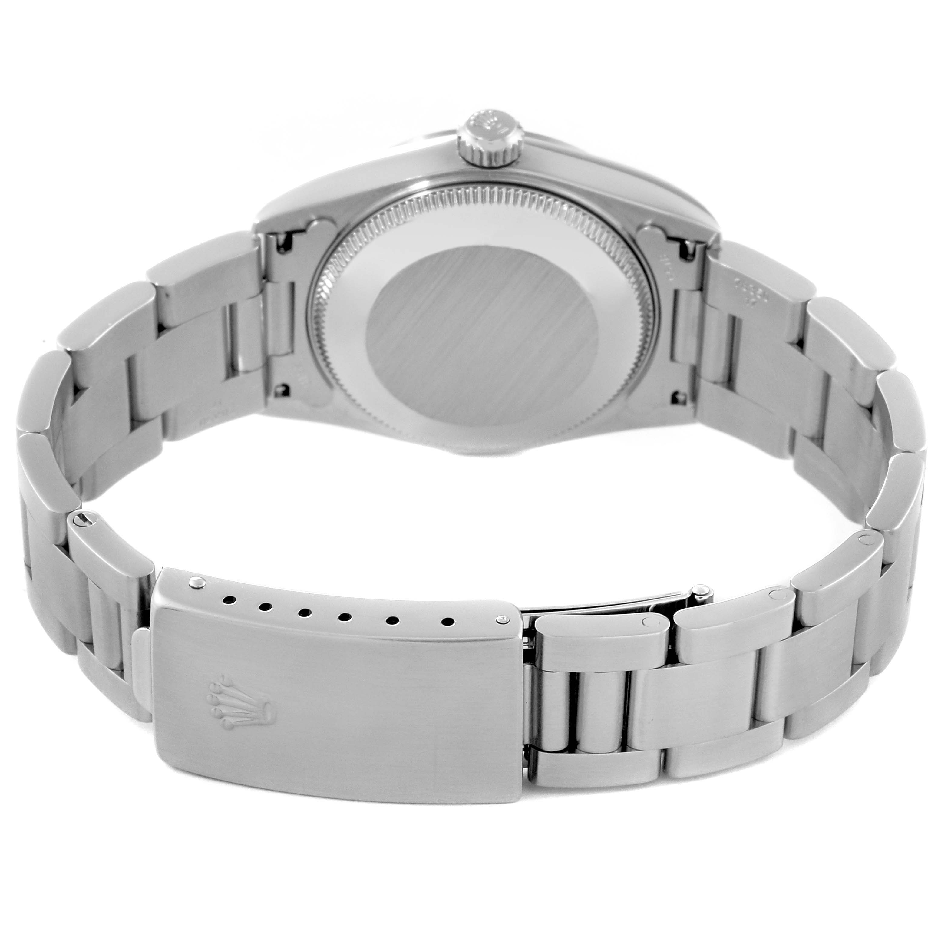 The image shows the back view of a Rolex Mid-Size 78240 Women's Stainless Steel White Dial 78240 Women's Stainless Steel White Dial model watch displaying its clasp, bracelet, and case back.