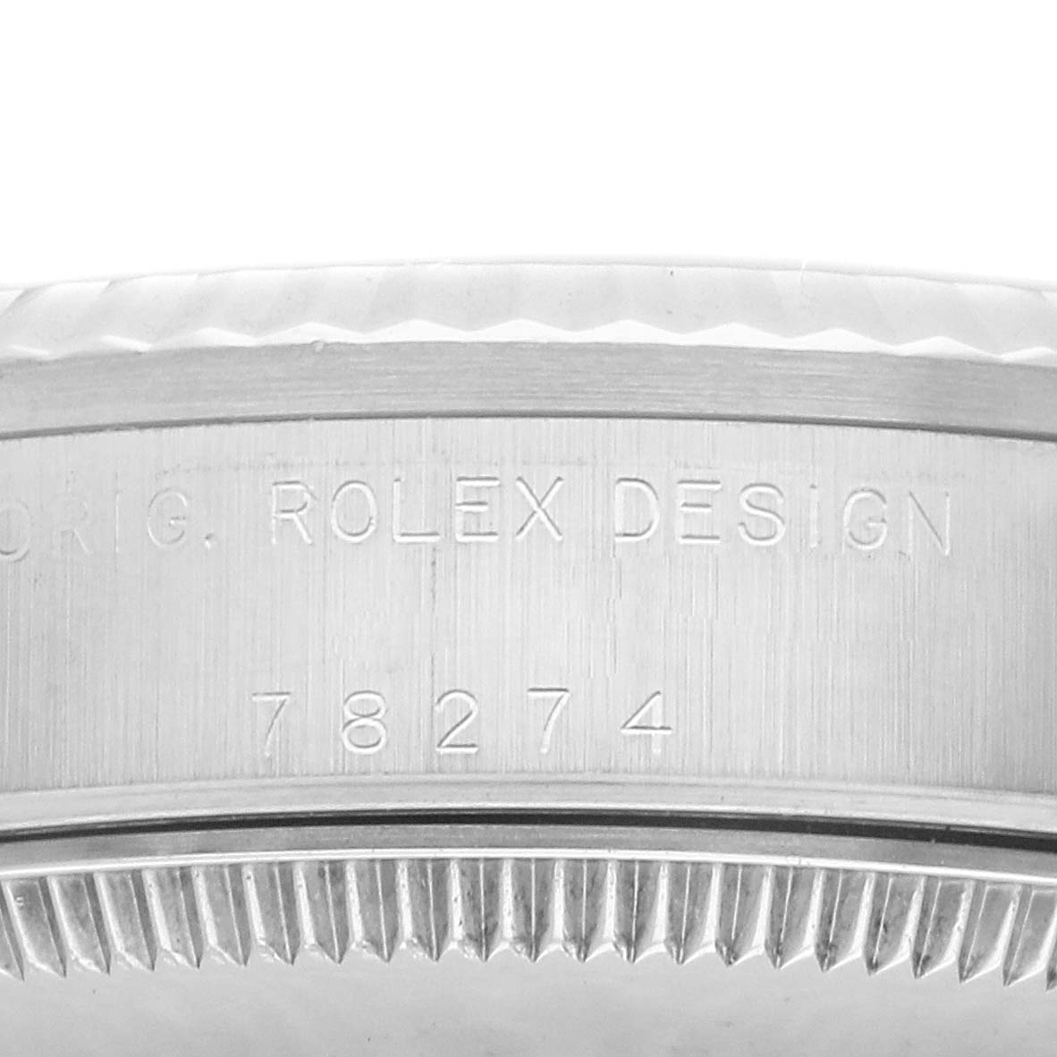 The image shows a close-up of the side of a Rolex Mid-Size Men
s watch, model number 78274, featuring the "ROLEX DESIGN" inscription and part of the bezel.