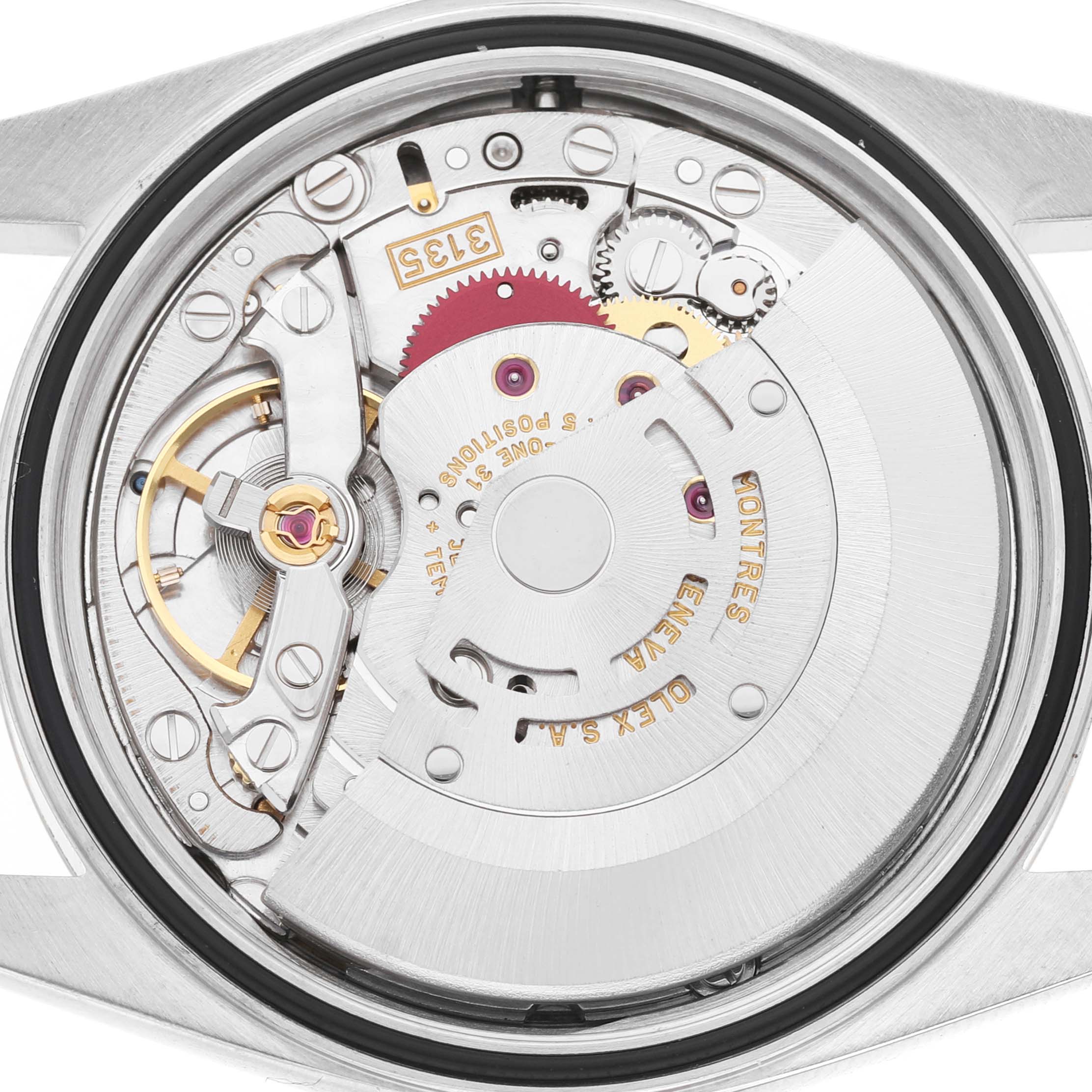 The image shows the Rolex Datejust 16233 Men's Stainless Steel White Dial movement from the back, highlighting gears and the rotor.