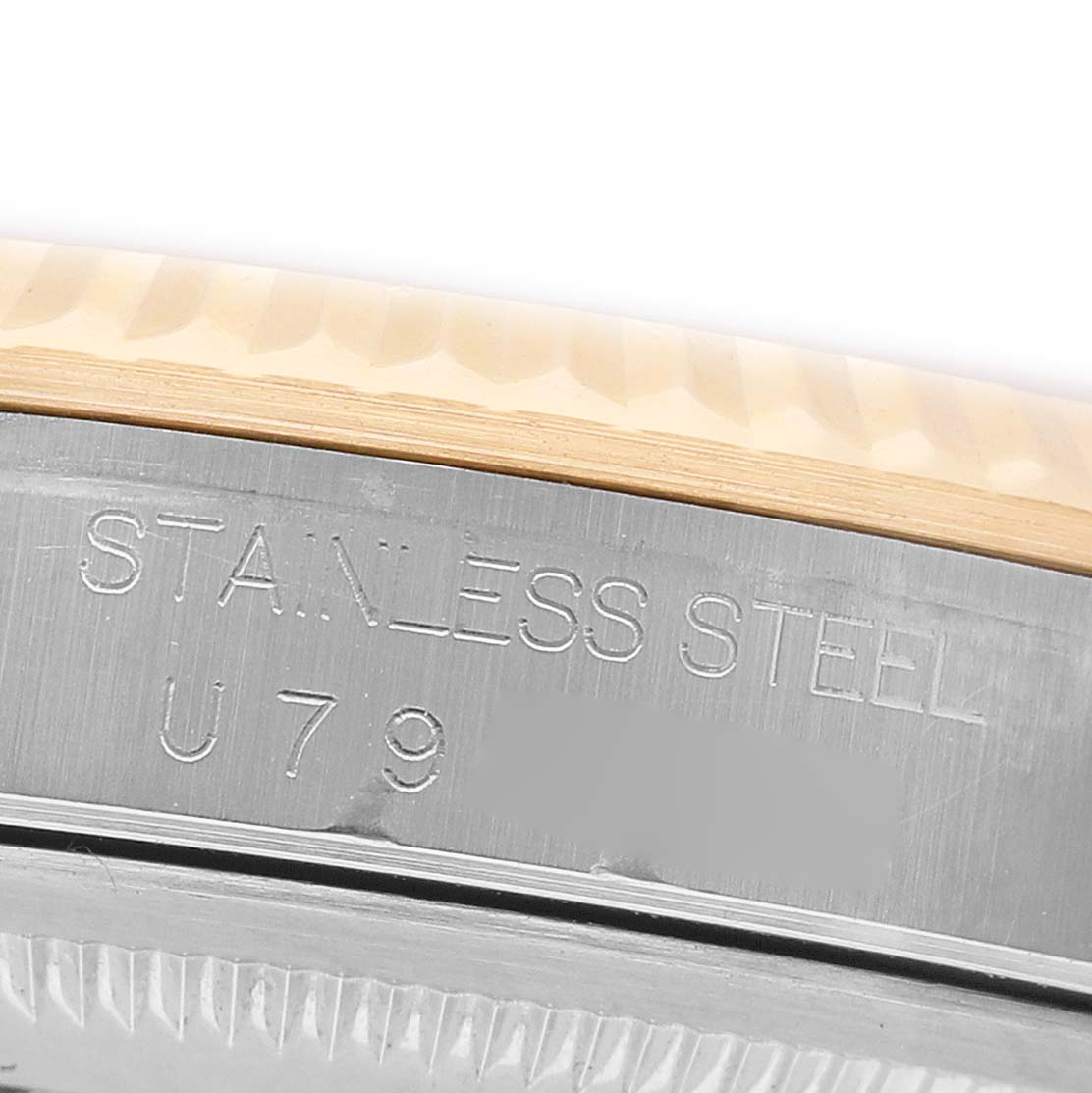 The image shows a close-up of the case side of a Rolex Datejust 16233 Men's Stainless Steel White Dial, highlighting the "Stainless Steel" engraving.