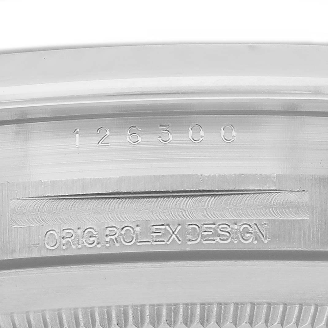 The image shows the side engraving of the Rolex Datejust 41 126300 Men's Stainless Steel Grey Dial, displaying the model number and "ORIG. ROLEX DESIGN."