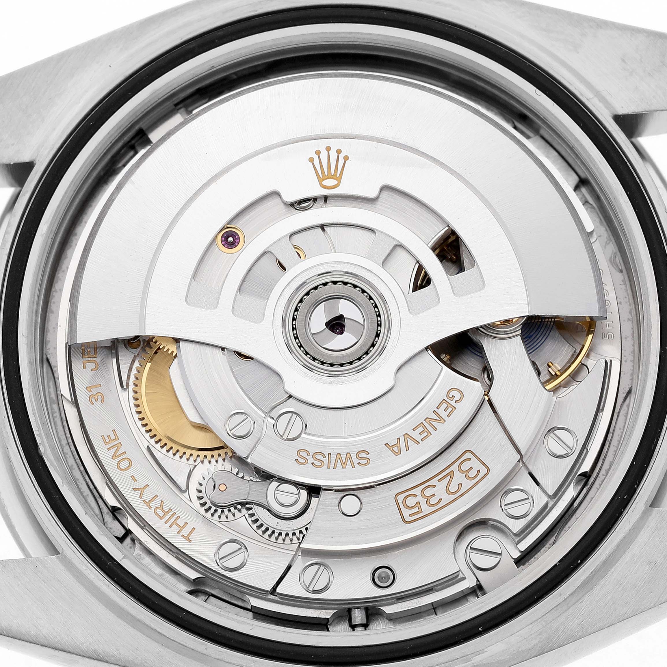 The image shows the movement of the Rolex Datejust 41 126300 Men's Stainless Steel Grey Dial from a view of the back case, highlighting its intricate mechanics.
