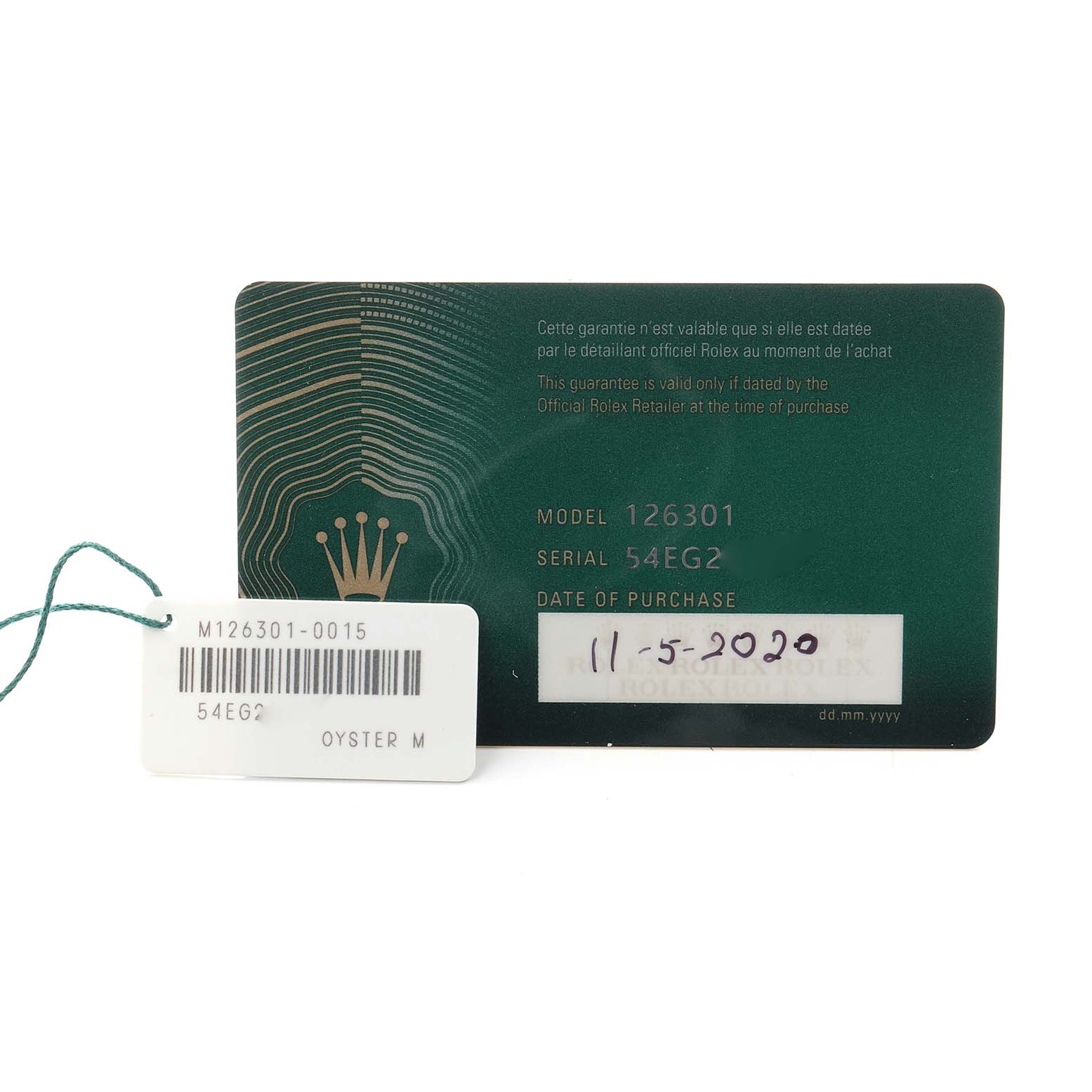 The image shows a warranty card and a tag for the Rolex Datejust 41, model number 126301, highlighting model and serial numbers, and purchase date information.
