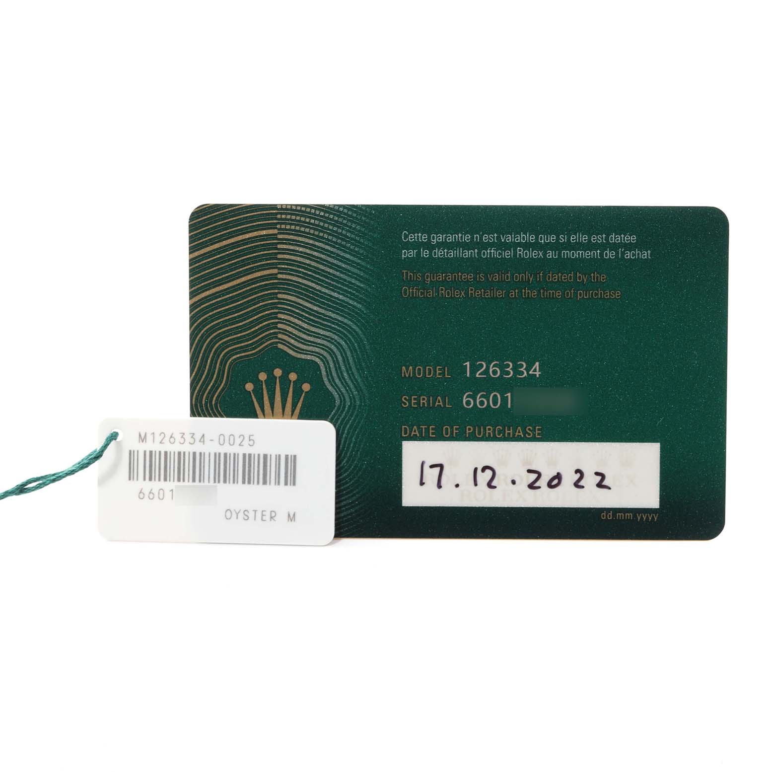 This image shows the warranty card and tag for a Rolex Datejust 41 126334 Men's Stainless Steel Blue Dial 126334 Men's Stainless Steel Blue Dial model.