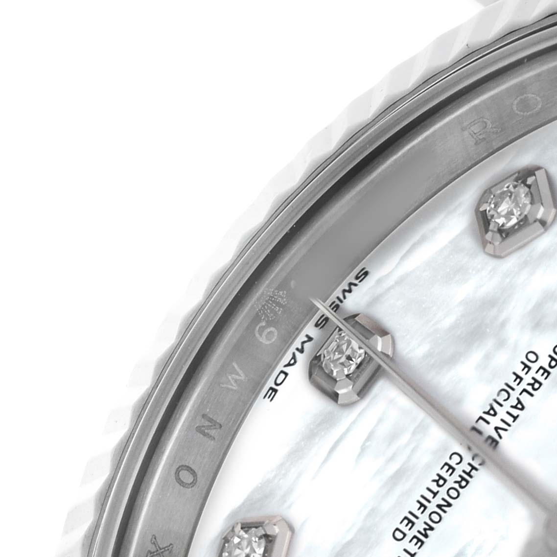 The image shows a close-up of the Rolex Datejust 41 126334 Men's Stainless Steel Mother of Pearl Dial's dial, featuring diamond hour markers and the edge of the bezel.