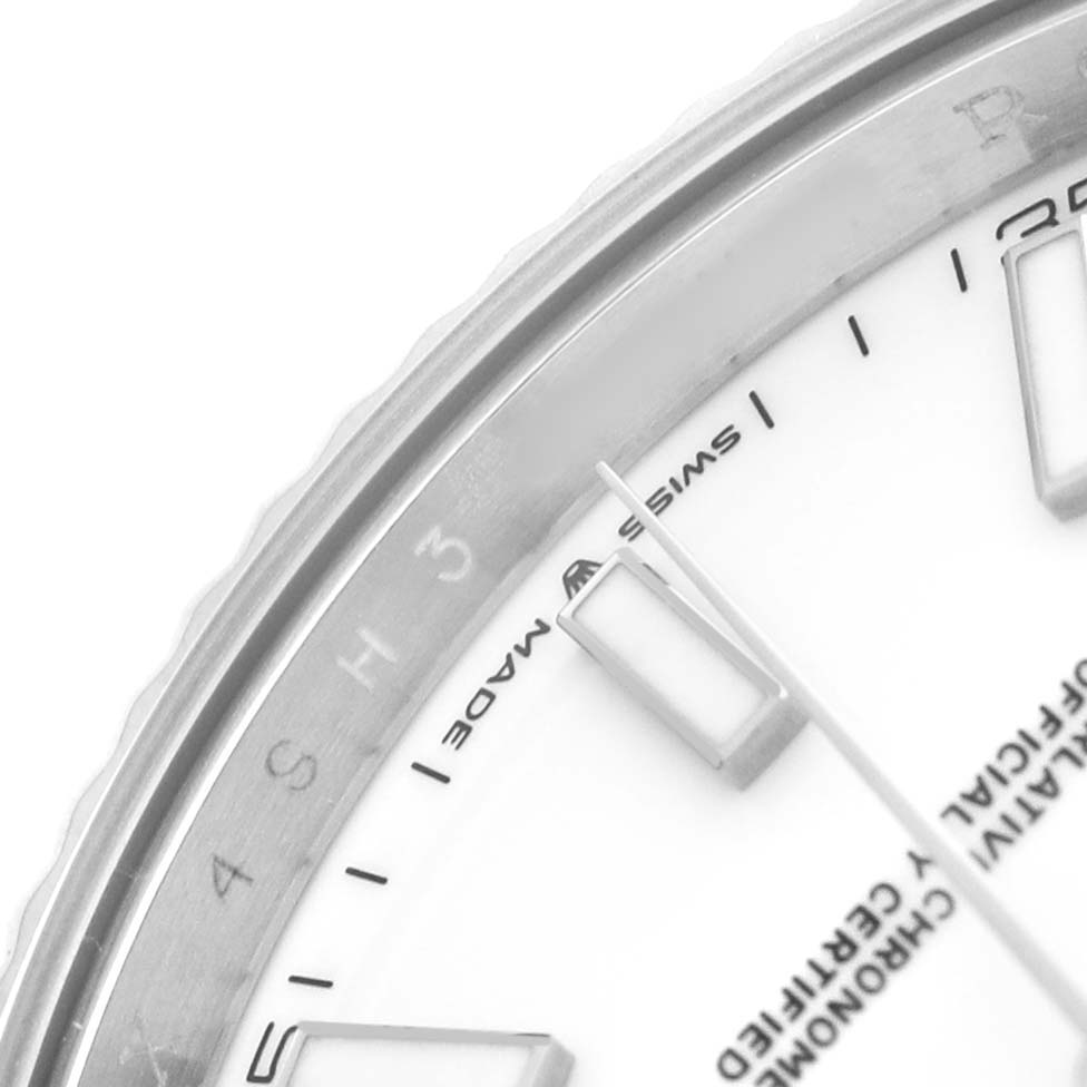 The image shows a close-up angle of the Rolex Datejust 41 126334 Men's Stainless Steel White Dial's dial and bezel, highlighting markers and part of the text.