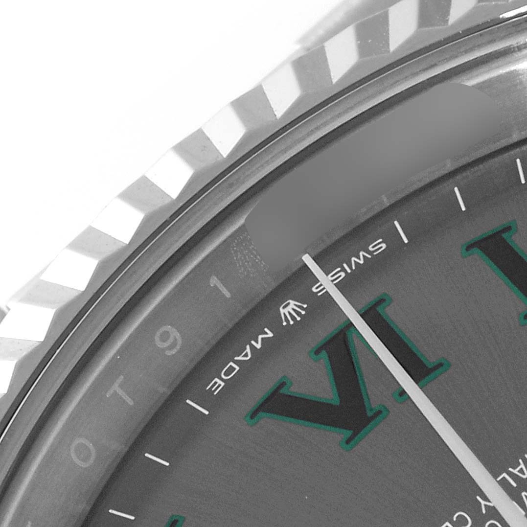 This image shows a close-up of the dial and bezel of the Rolex 126334 Men
s Stainless Steel Grey Dial 126334 Men
s Stainless Steel Grey Dial Datejust 41 126334 Steel White Gold Wimbledon Dial Men
s Watch.
