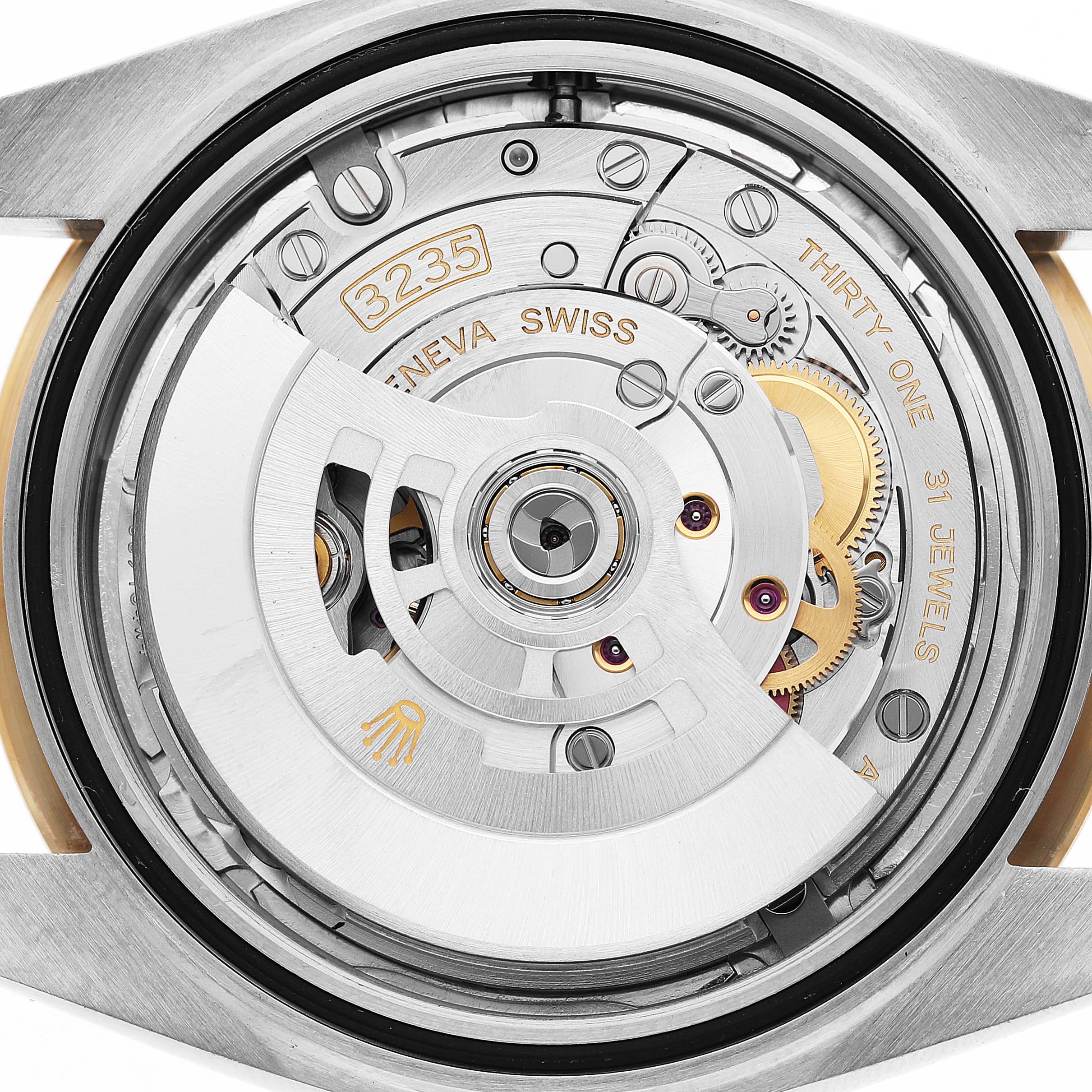 The image shows the movement from the back angle of a Rolex Datejust 41 126333 Men's Steel and Gold (two tone) Silver Dial, highlighting gears and the 3235 caliber.