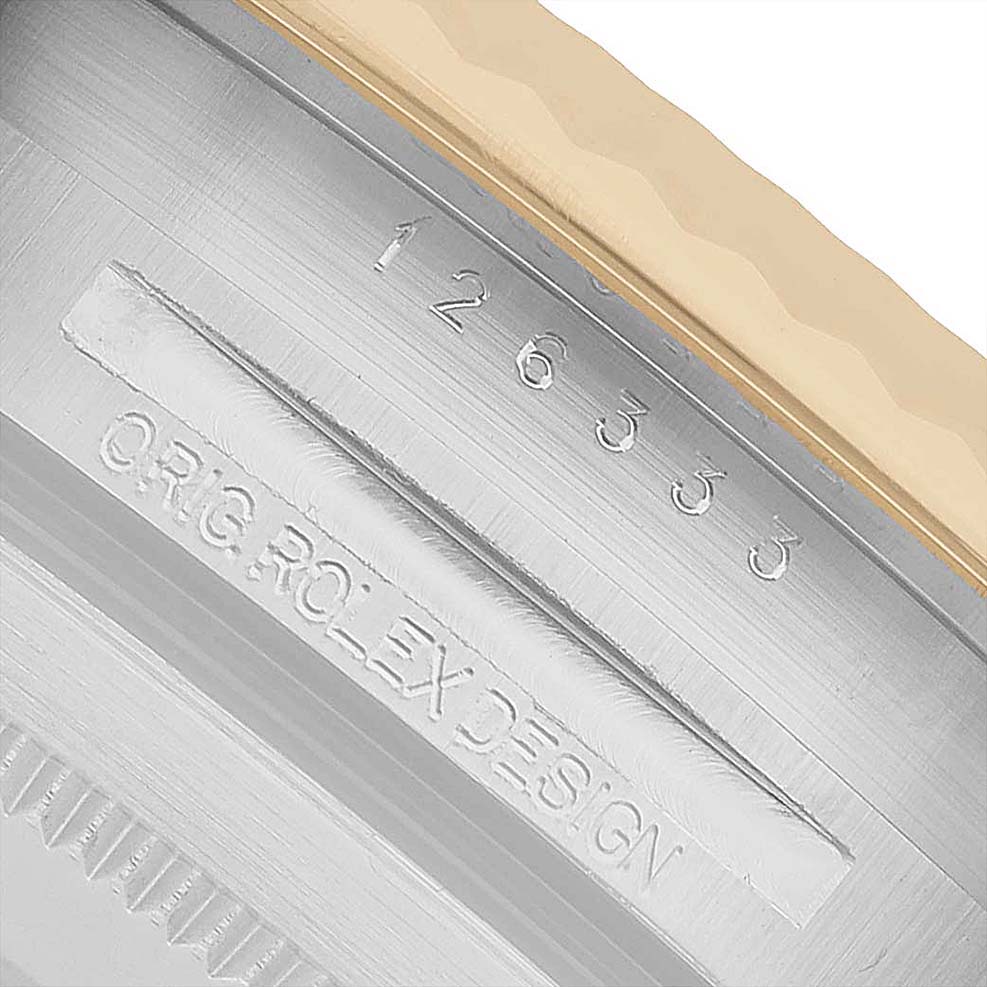 The image shows the engraved side of a Rolex Datejust 41 126333 Men's Steel and Gold (two tone) Silver Dial, highlighting the "Orig. Rolex Design" and model number.