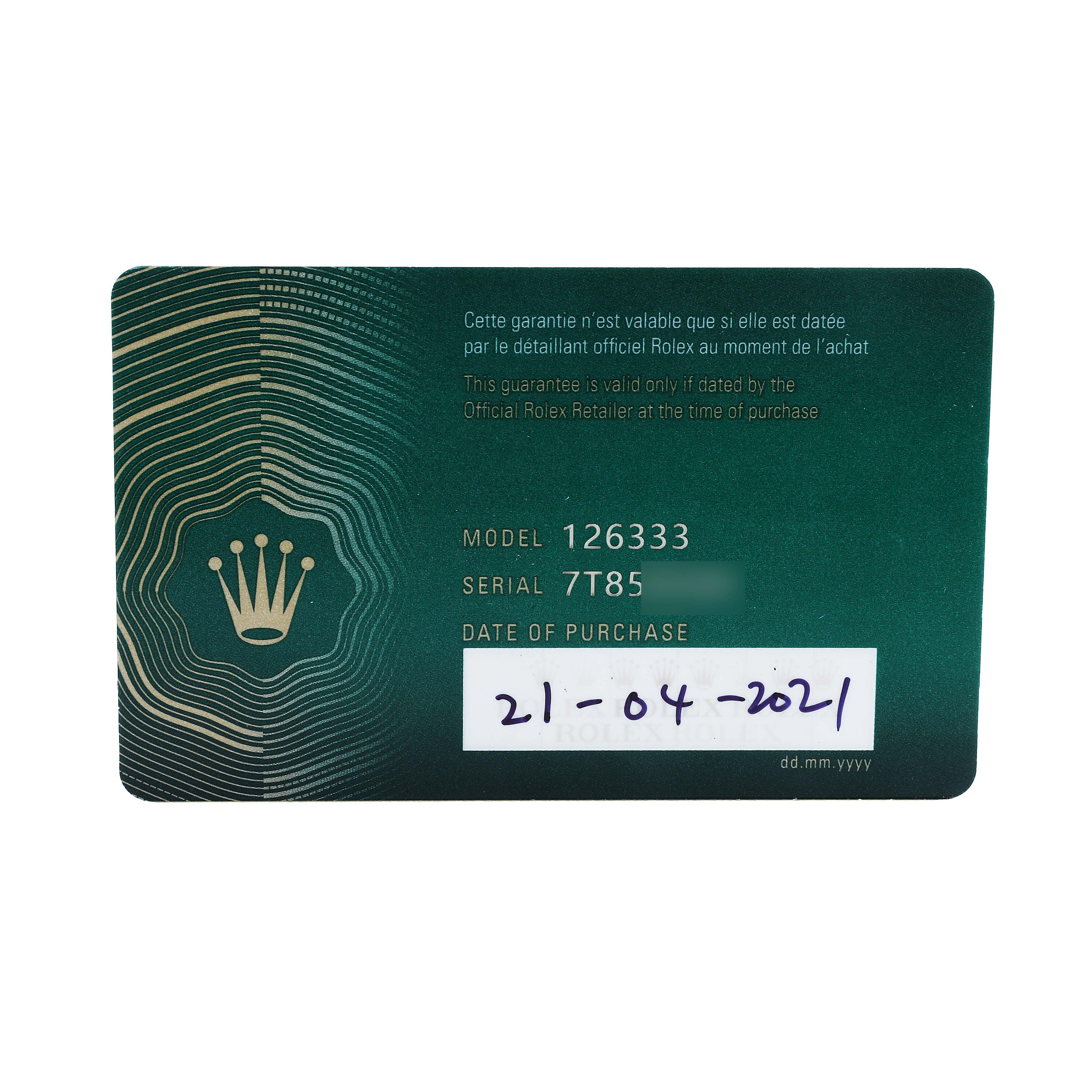 The image shows a Rolex Datejust 41 126333 Men's Steel and Gold (two tone) Silver Dial guarantee card with model, serial number, and purchase date information.