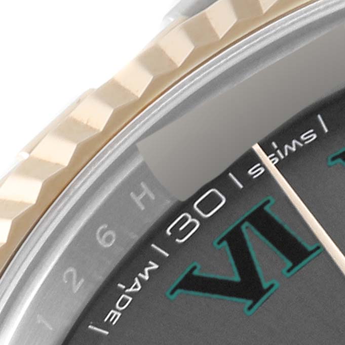 This image shows a close-up of the bezel, dial, and part of the Roman numeral hour markers of the Rolex Datejust 41 126333 Men's Steel and Gold (two tone) Grey Dial 126333 Men's Steel and Gold (two tone) Grey Dial watch.