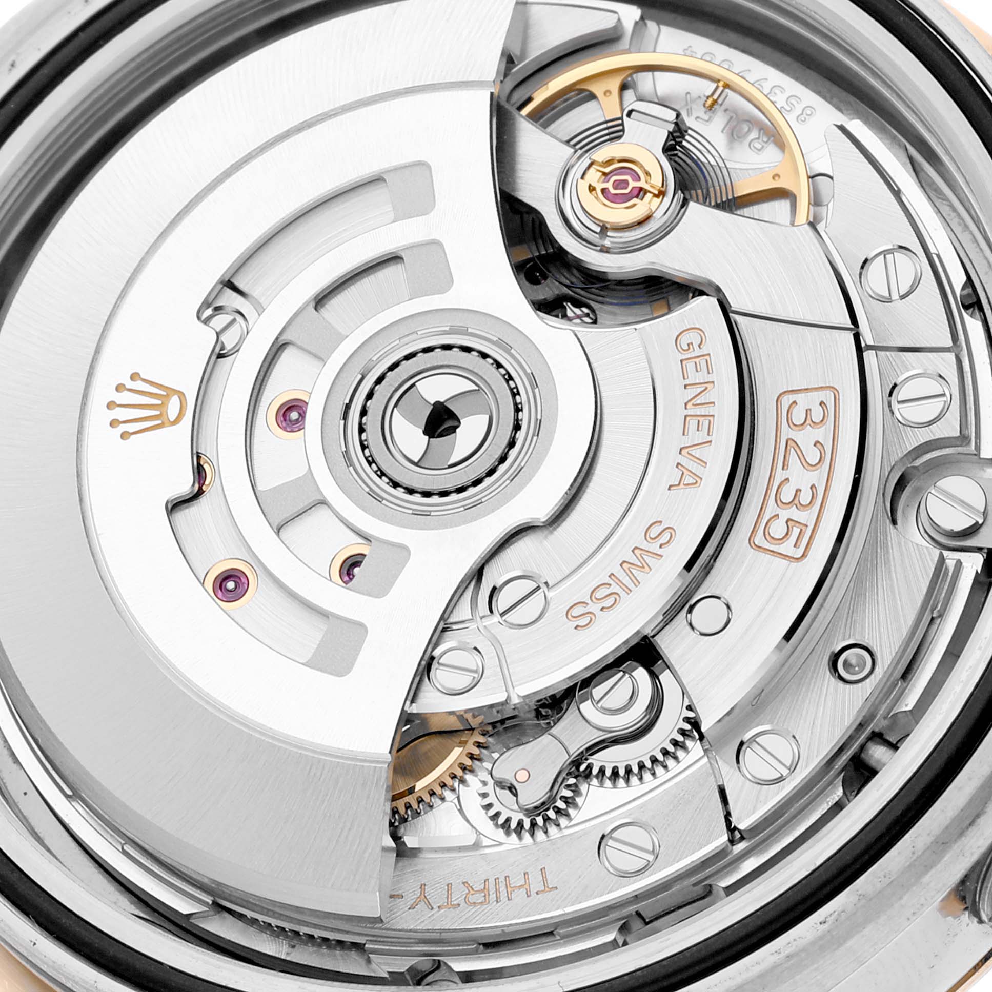 The image shows a close-up view of the movement parts of the Rolex Datejust 41 126333 Men's Steel and Gold (two tone) Grey Dial 126333 Men's Steel and Gold (two tone) Grey Dial model.