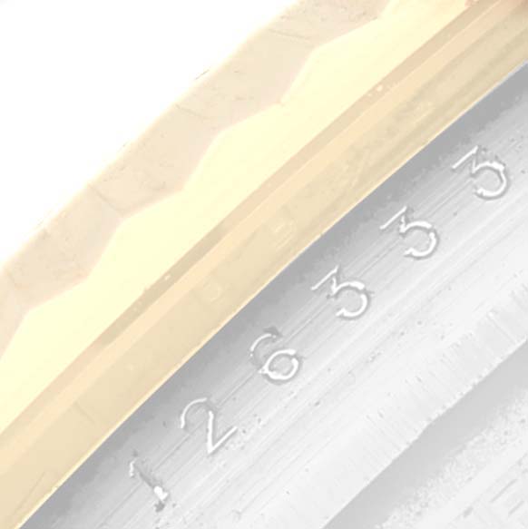 Close-up angle of the Rolex Datejust 41 126333 Men's Steel and Gold (two tone) Grey Dial 126333 Men's Steel and Gold (two tone) Grey Dial model showing the inner bezel with engraved serial numbers.