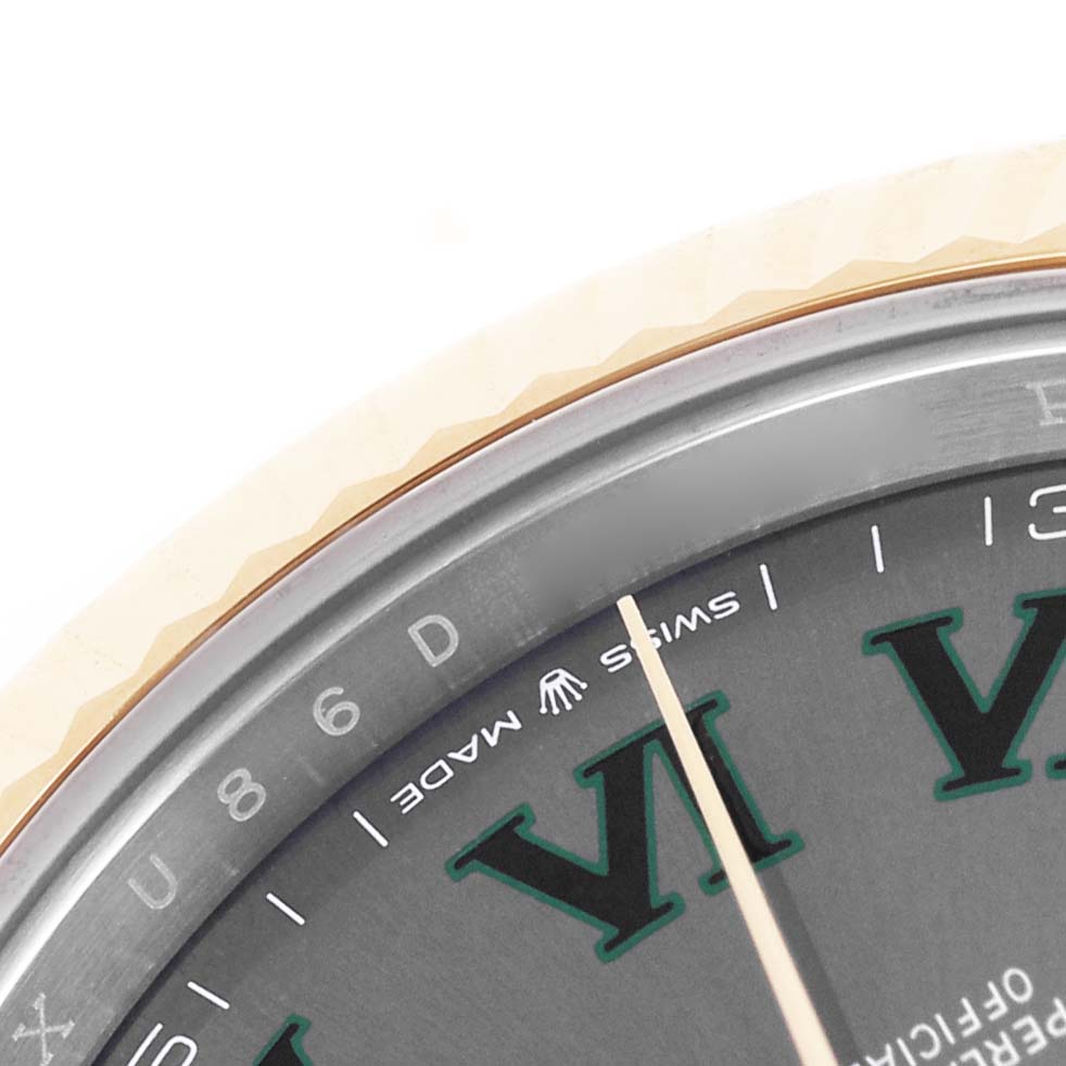 The image shows a close-up of the dial and partially visible fluted bezel of the Rolex Datejust 41 126333 Men's Steel and Gold (two tone) Grey Dial, highlighting the Roman numeral and Swiss Made text.
