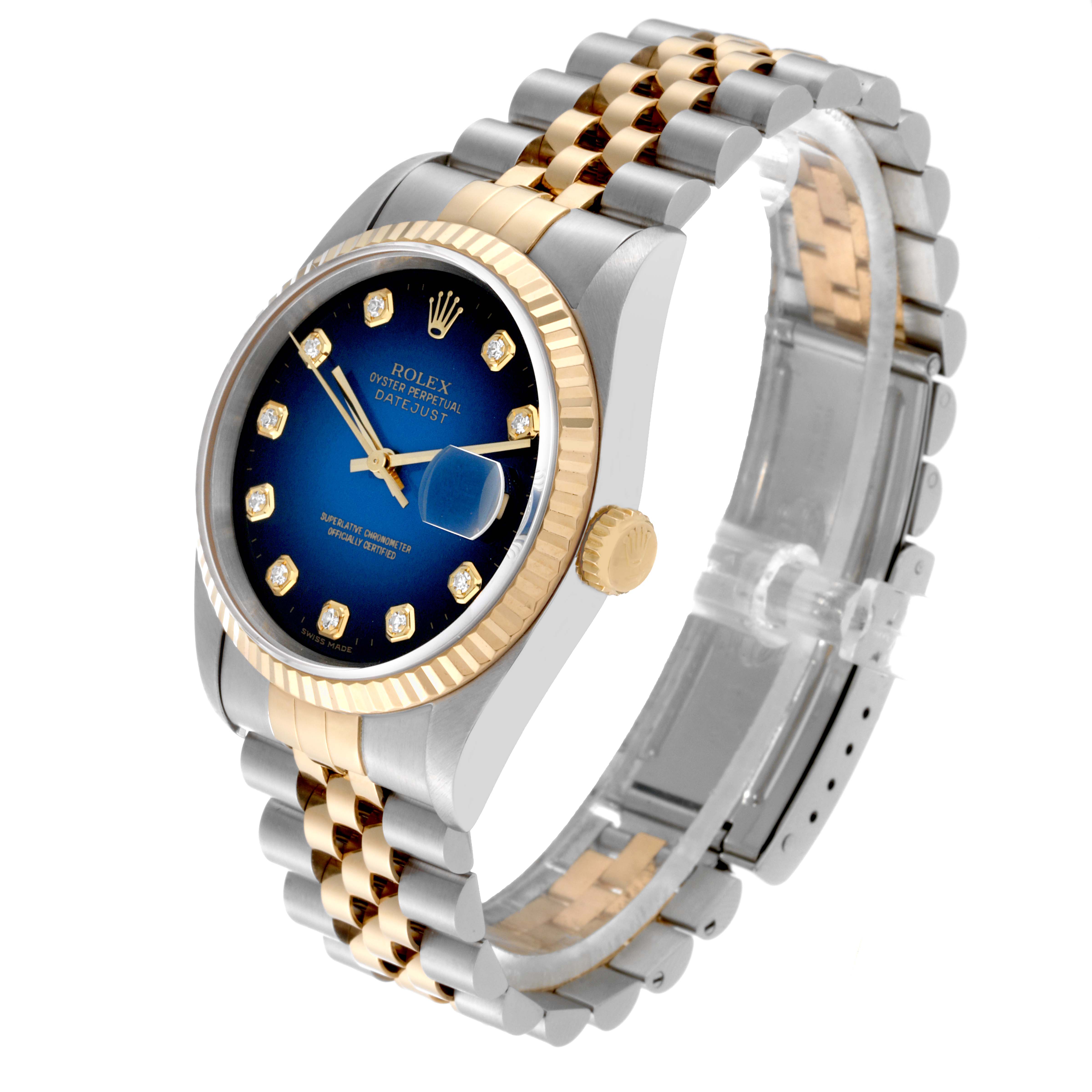 The image shows a Rolex Datejust 16233 Men's Steel and Gold (two tone) Blue Dial 16233 Men's Steel and Gold (two tone) Blue Dial watch at a three-quarter angle, displaying its blue dial, gold fluted bezel, and two-tone jubilee bracelet.