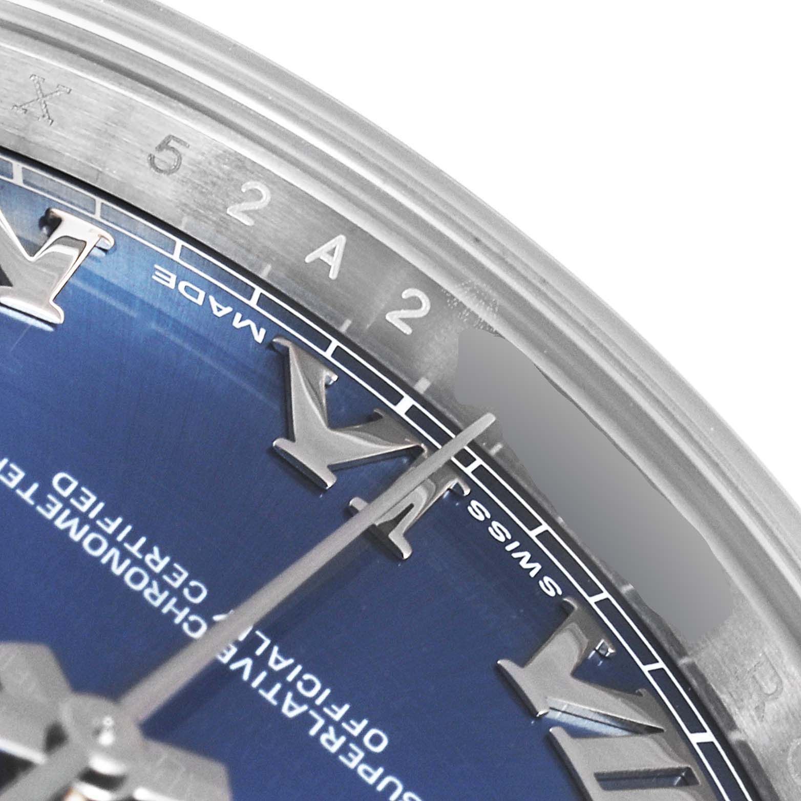 The image shows a close-up of the dial and part of the bezel of a Rolex Datejust 41 116300 Men's Stainless Steel Blue Dial 116300 Men's Stainless Steel Blue Dial watch, featuring roman numerals and a blue face.