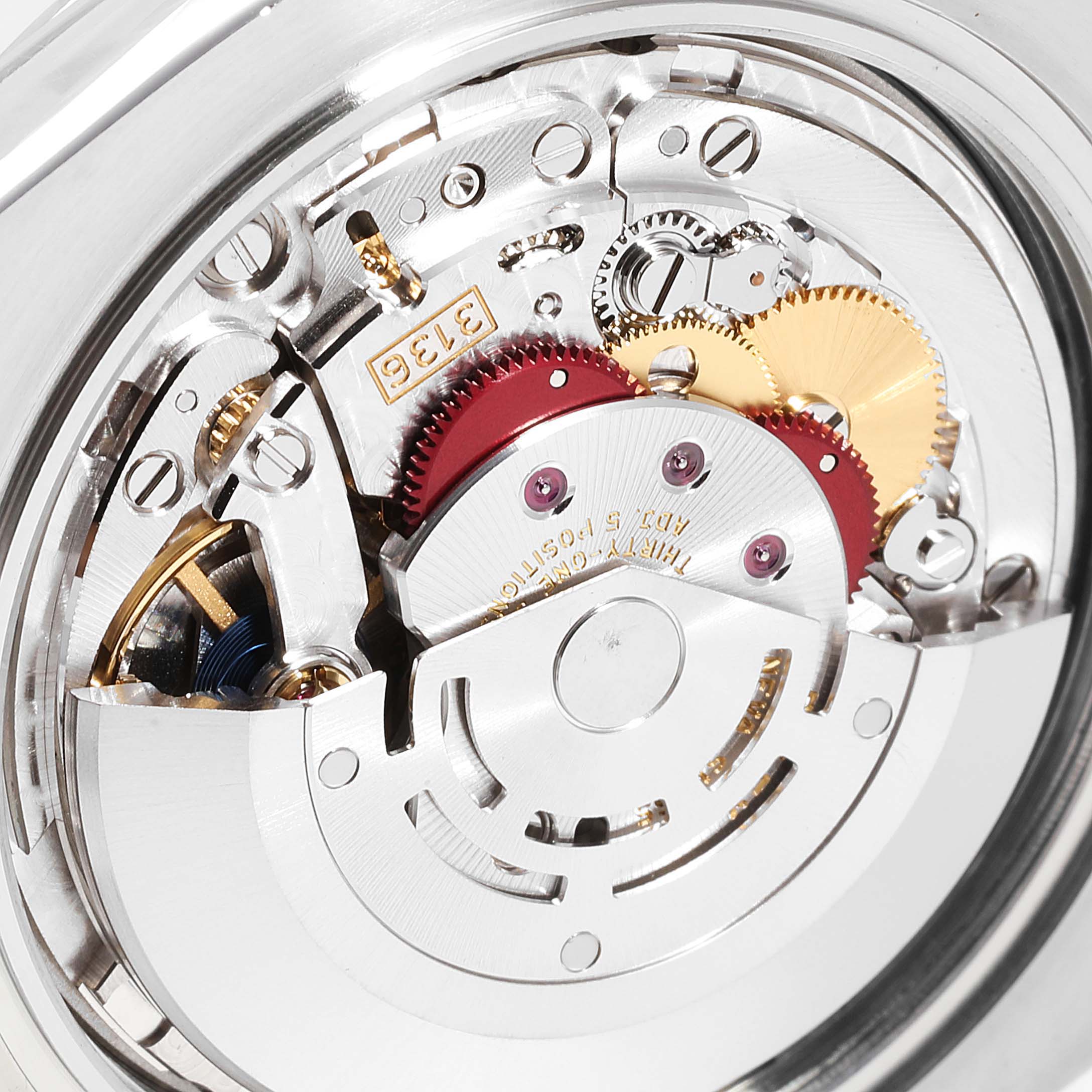 The image shows a close-up view of the movement mechanism inside the Rolex Datejust 41 116300 Men's Stainless Steel Blue Dial 116300 Men's Stainless Steel Blue Dial watch.