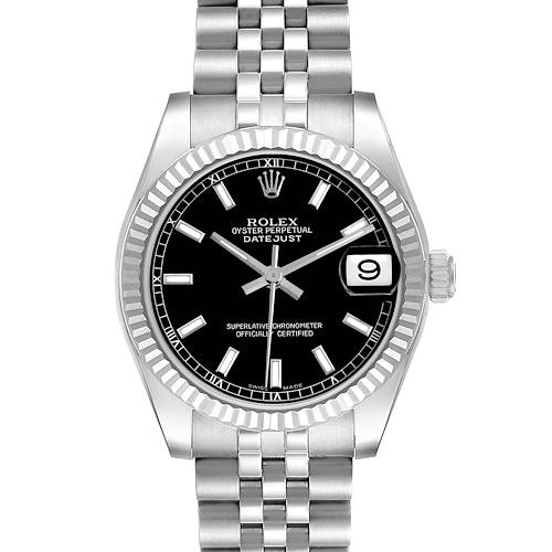 The Rolex Datejust Mid-Size watch is shown from a front angle, displaying its black dial, fluted bezel, date window, and Jubilee bracelet.