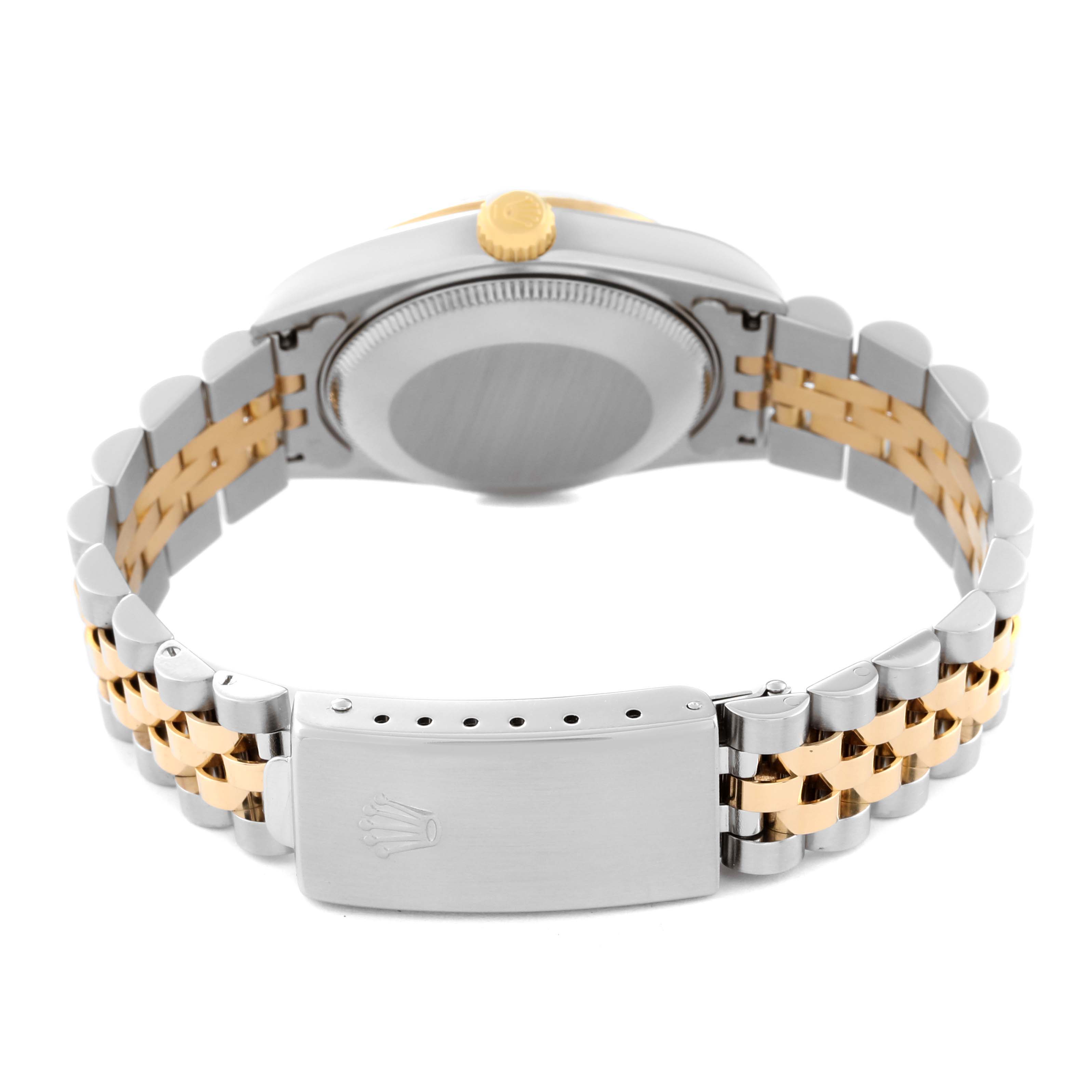 This image shows the back view of a Mid-Size Rolex watch, highlighting its two-tone bracelet and clasp.