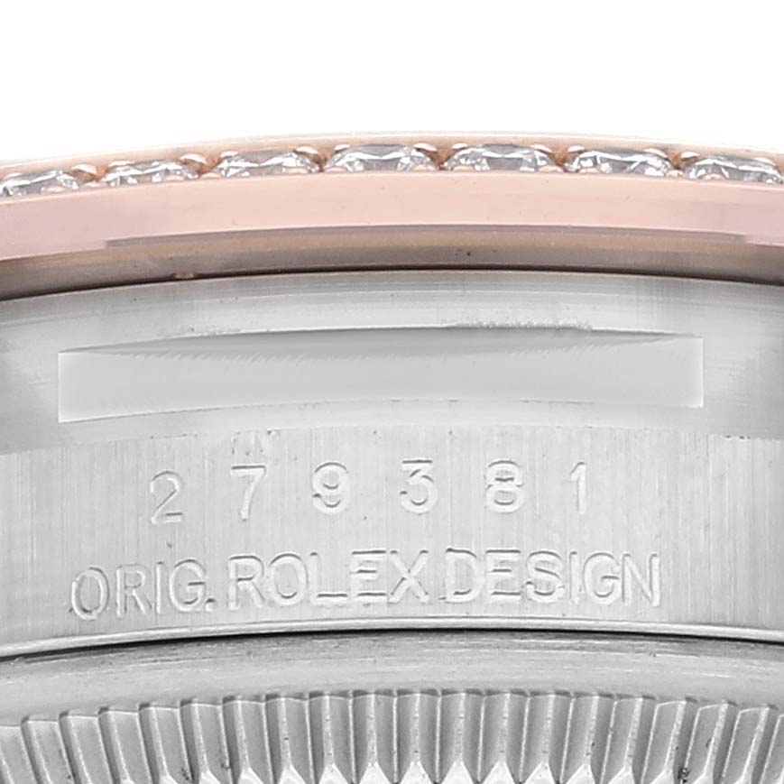 The image shows a close-up of the engraved case back and the diamond-set bezel of a Rolex Datejust 279381 Women's Steel and Gold (two tone) Green Dial 279381 Women's Steel and Gold (two tone) Green Dial watch.