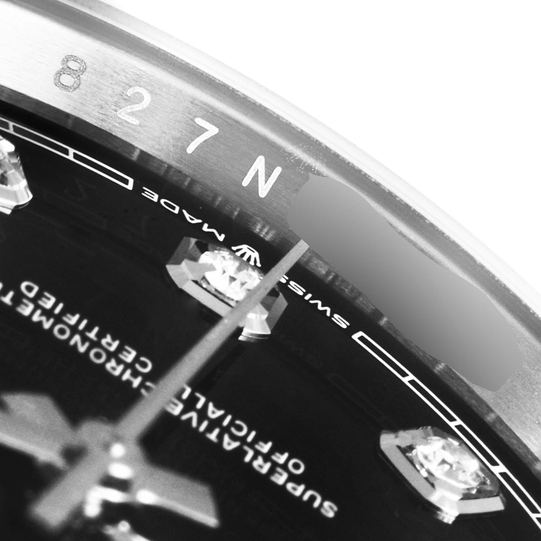 The image shows a close-up of the dial and bezel of a Rolex Datejust 126234 Men's Stainless Steel Black Dial 126234 Men's Stainless Steel Black Dial watch, highlighting the "Swiss Made" text and hour markers.