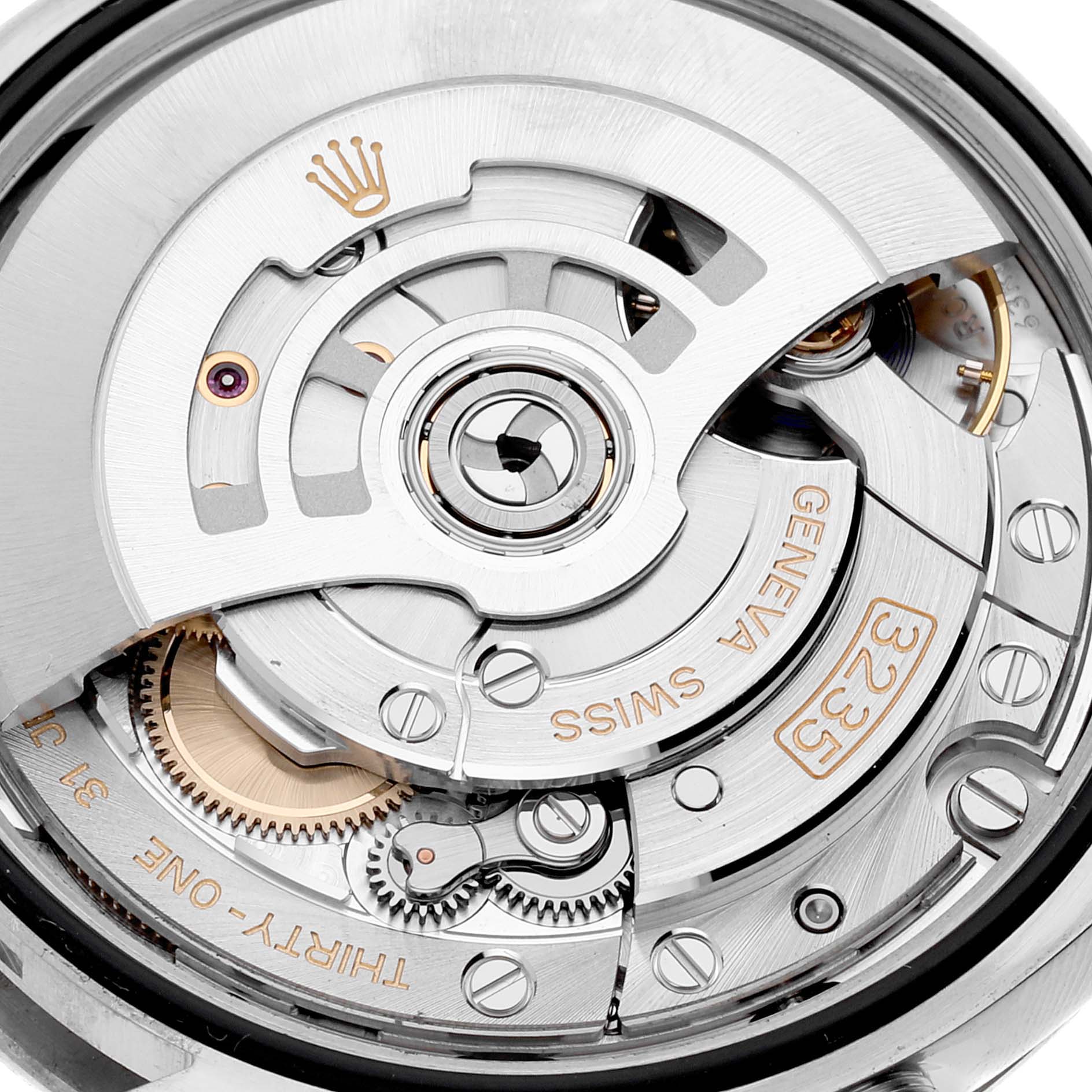 The image shows the intricate movement parts of a Rolex Datejust 126234 Men's Stainless Steel Silver Dial 126234 Men's Stainless Steel Silver Dial watch from a close-up angle.