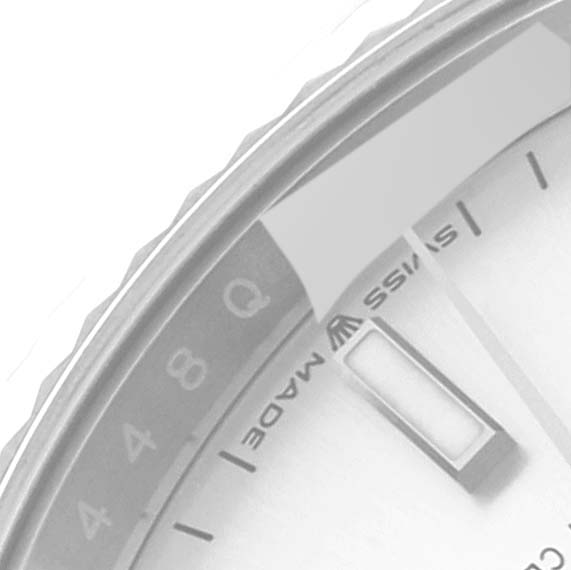 The image shows a partial view of the Rolex Datejust 126234 Men's Stainless Steel Silver Dial 126234 Men's Stainless Steel Silver Dial dial and the outer edge of the bezel at an oblique angle.