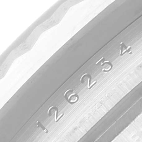 The image shows a close-up of the bezel and engraved serial number on a Rolex Datejust 126234 Men's Stainless Steel Silver Dial 126234 Men's Stainless Steel Silver Dial watch.