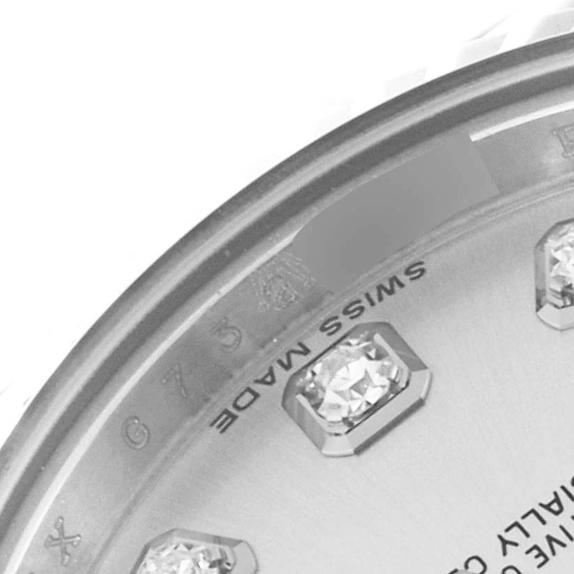 The image shows a close-up of the dial and part of the bezel of a Rolex Datejust 179174 Women's Stainless Steel Silver Dial 179174 Women's Stainless Steel Silver Dial watch, including diamond hour markers and the "Swiss Made" label.
