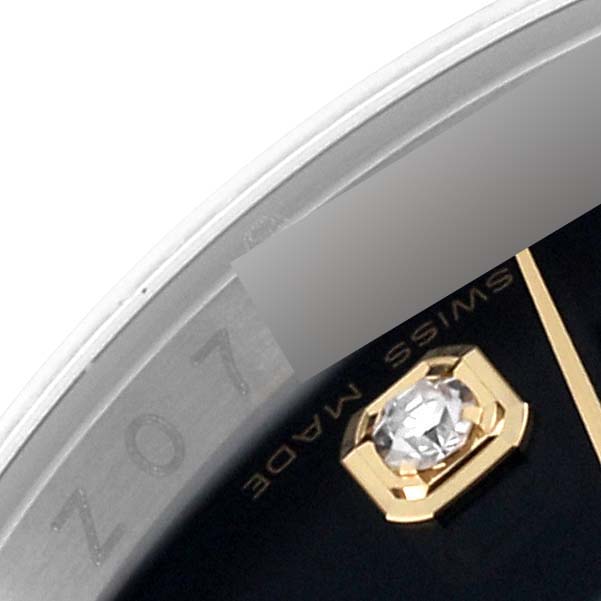This is a close-up of the dial and bezel of the Rolex Datejust 116233 Men's Steel and Gold (two tone) Black Dial 116233 Men's Steel and Gold (two tone) Black Dial watch, highlighting a diamond marker.