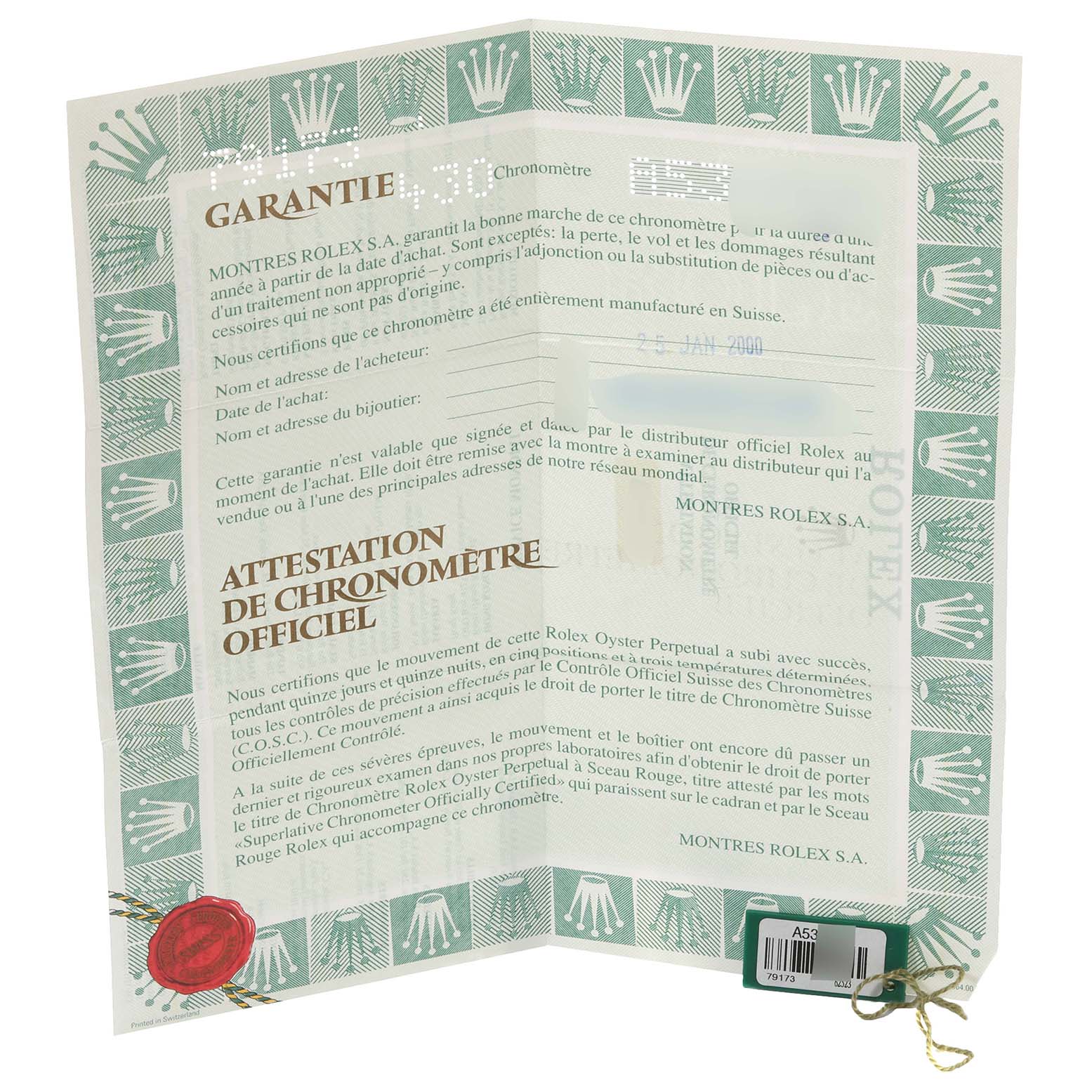 This image shows an open Rolex Datejust 79173 Women's Steel and Gold (two tone) Blue Dial 79173 Women's Steel and Gold (two tone) Blue Dial warranty and chronometer certificate at an angle.